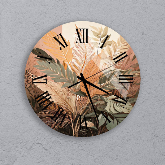 a clock with a painting of leaves on it