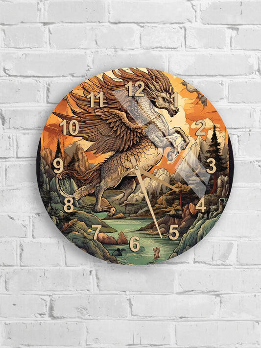 A round wall clock with an illustration of a winged creature, possibly a dragon or mythical animal, against a backdrop of mountains and a sunset.