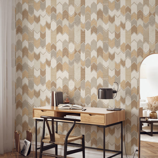a modern workspace with a wooden desk, a black lamp, and a bookshelf. The wall behind the desk has a geometric patterned wallpaper.