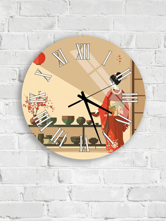 A round wall clock with a design featuring a woman in traditional Japanese attire, surrounded by various decorative elements such as vases and a potted plant.