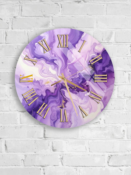 A round wall clock with a purple and white marble-like design, featuring gold Roman numerals and hands.