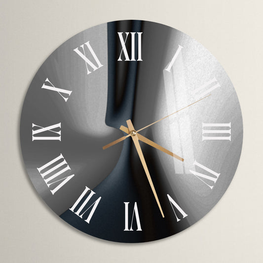 a black and white clock with roman numerals