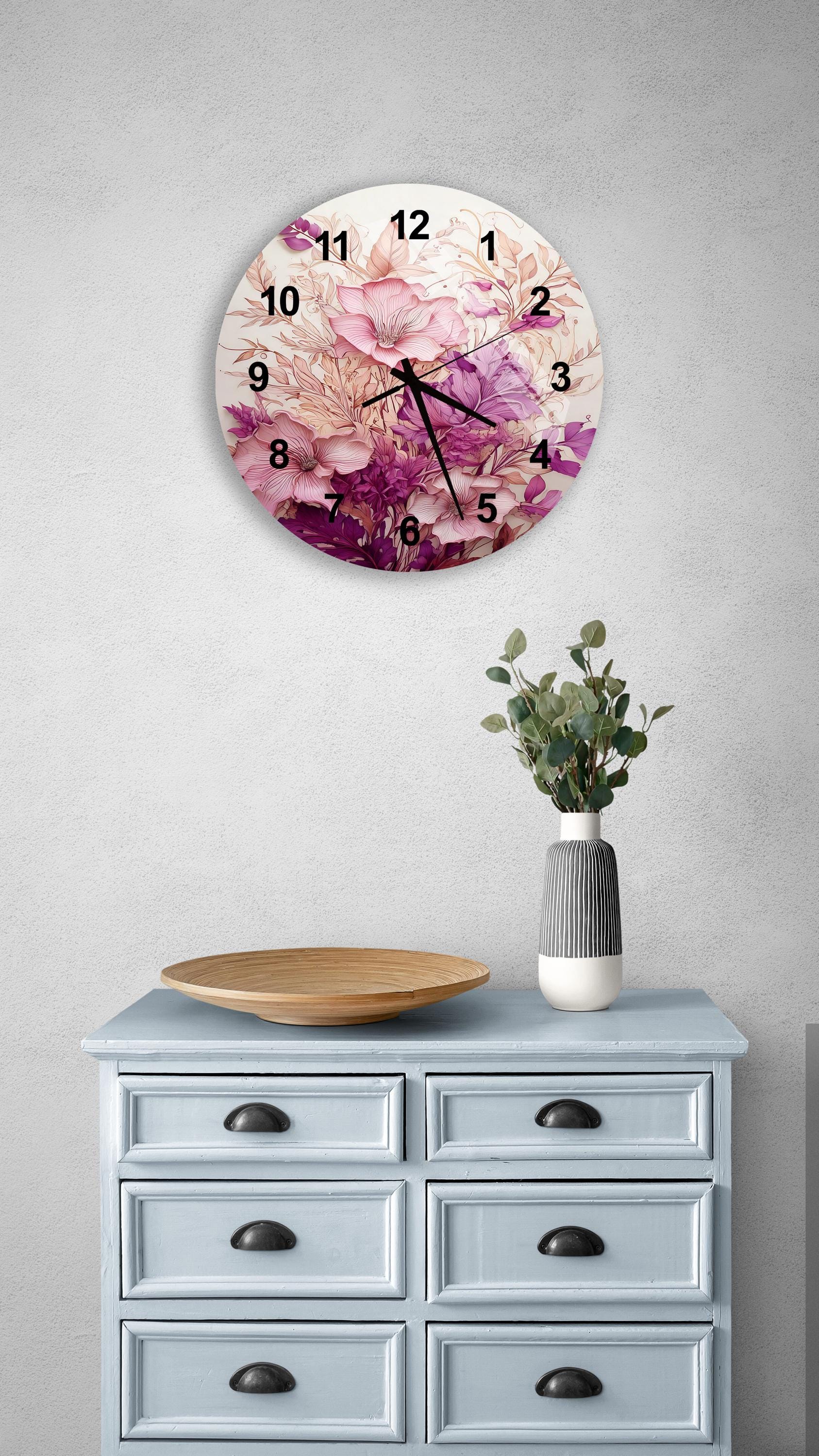 a clock on a wall above a dresser