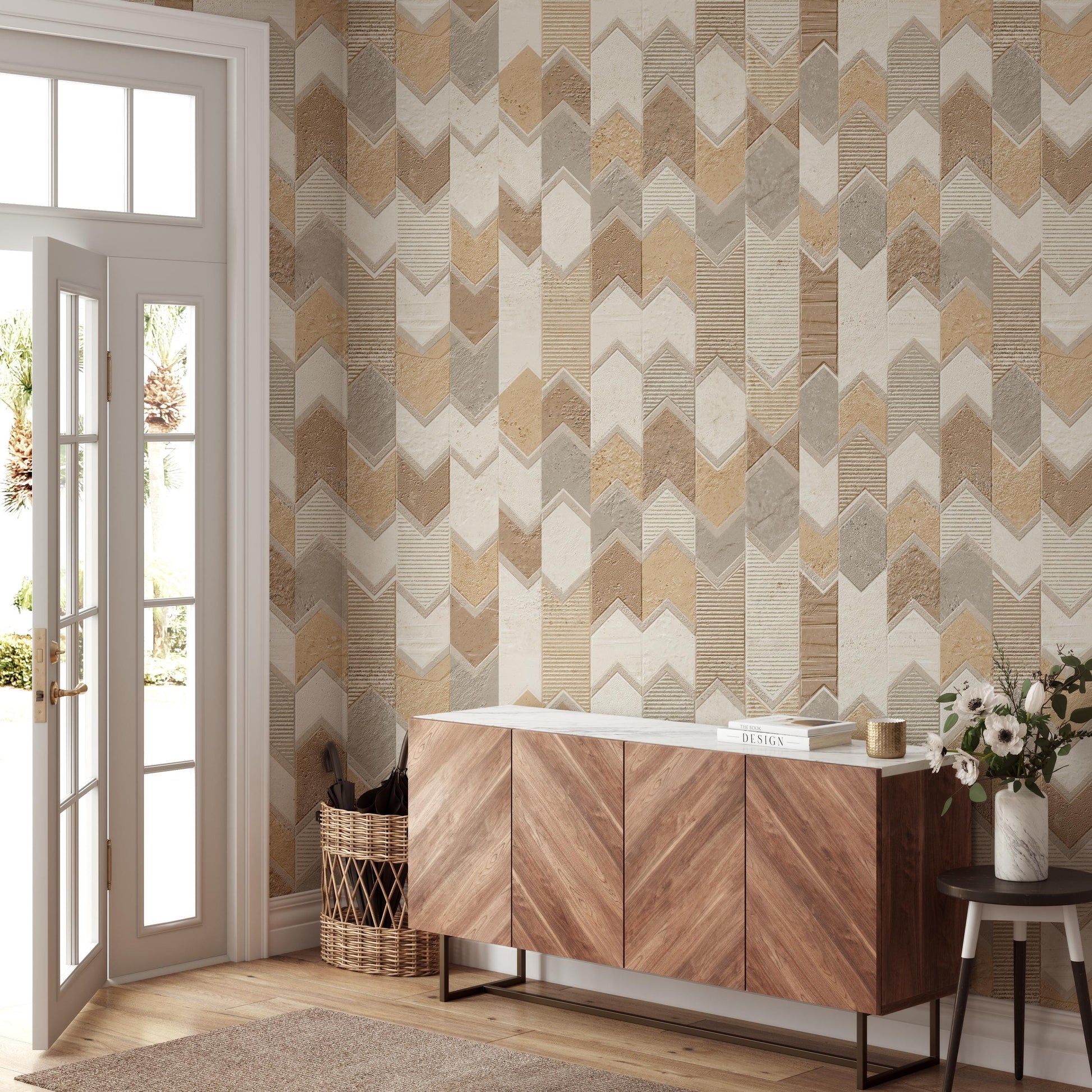 a modern and stylish interior design with a large wooden cabinet, a wicker basket, and a vase of flowers. The walls are adorned with a geometric pattern wallpaper in shades of beige and brown, creating a warm and inviting atmosphere. The room is well-lit, with natural light coming in through the windows, and the overall layout and design elements suggest a thoughtful and cohesive aesthetic.