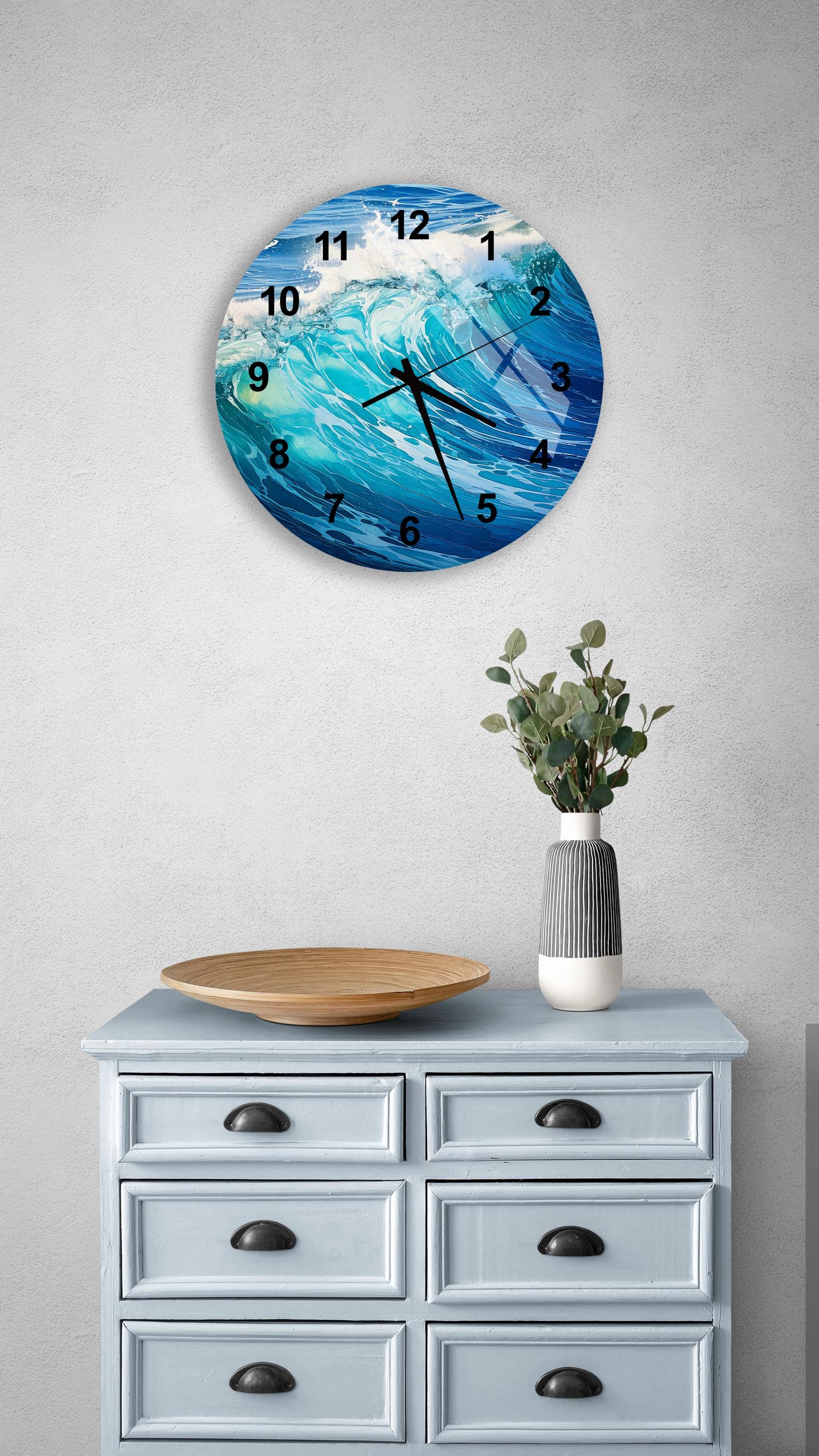 a clock on a wall above a dresser