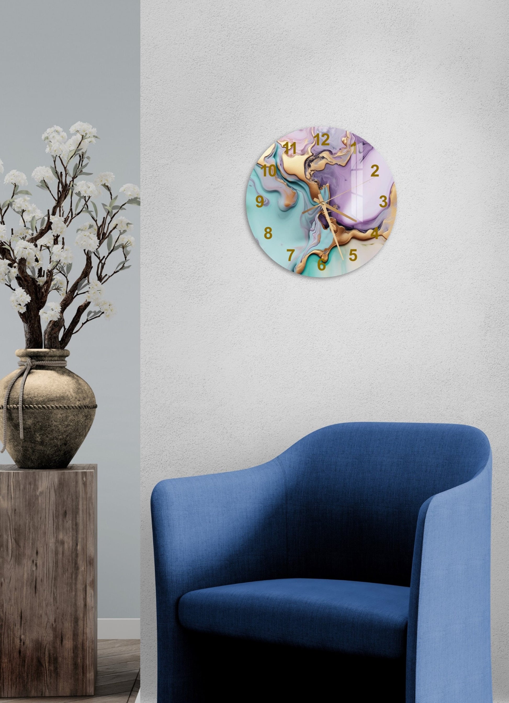 a blue chair sitting next to a clock on a wall