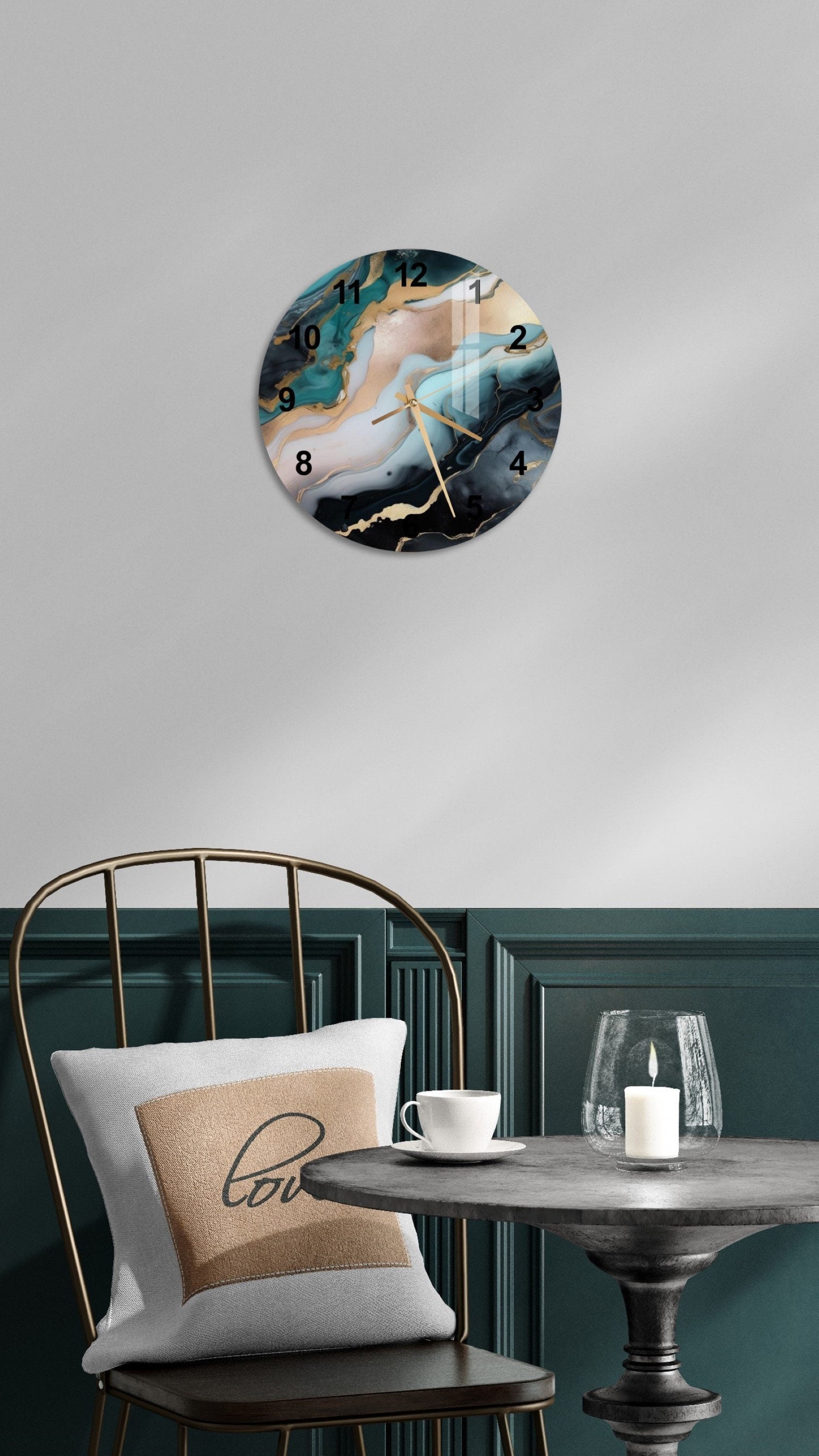 a clock that is on the wall above a table
