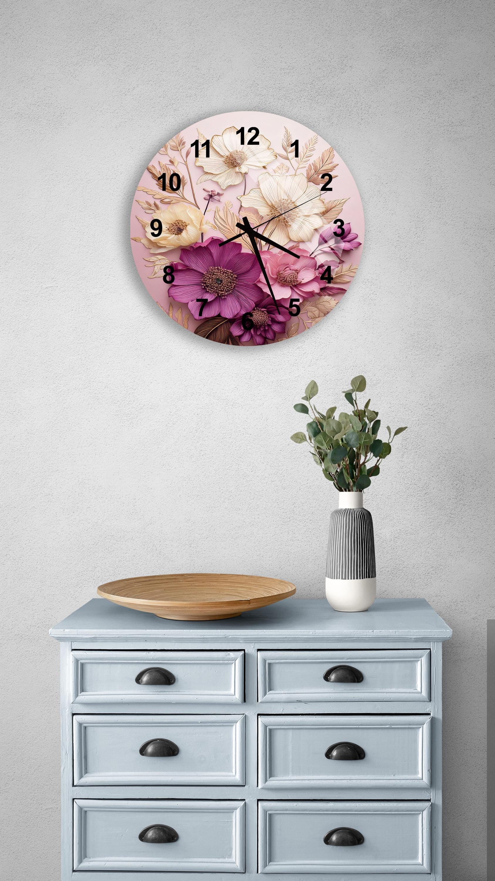 a clock on a wall above a dresser