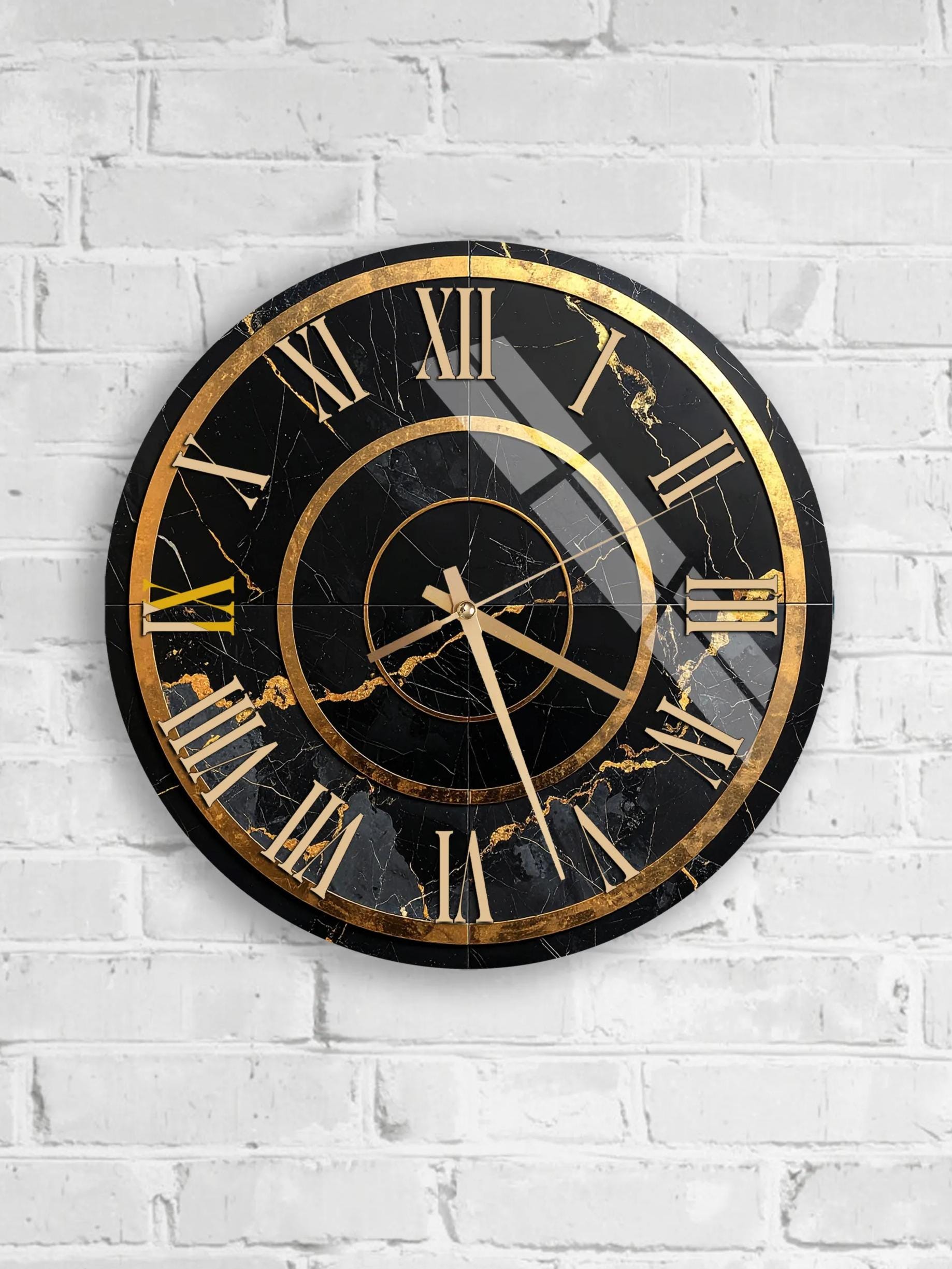 A black and gold wall clock with Roman numerals is mounted on a white brick wall.