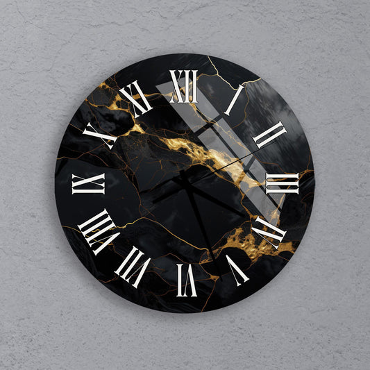 A black and gold marble-style clock with Roman numerals on a gray wall.