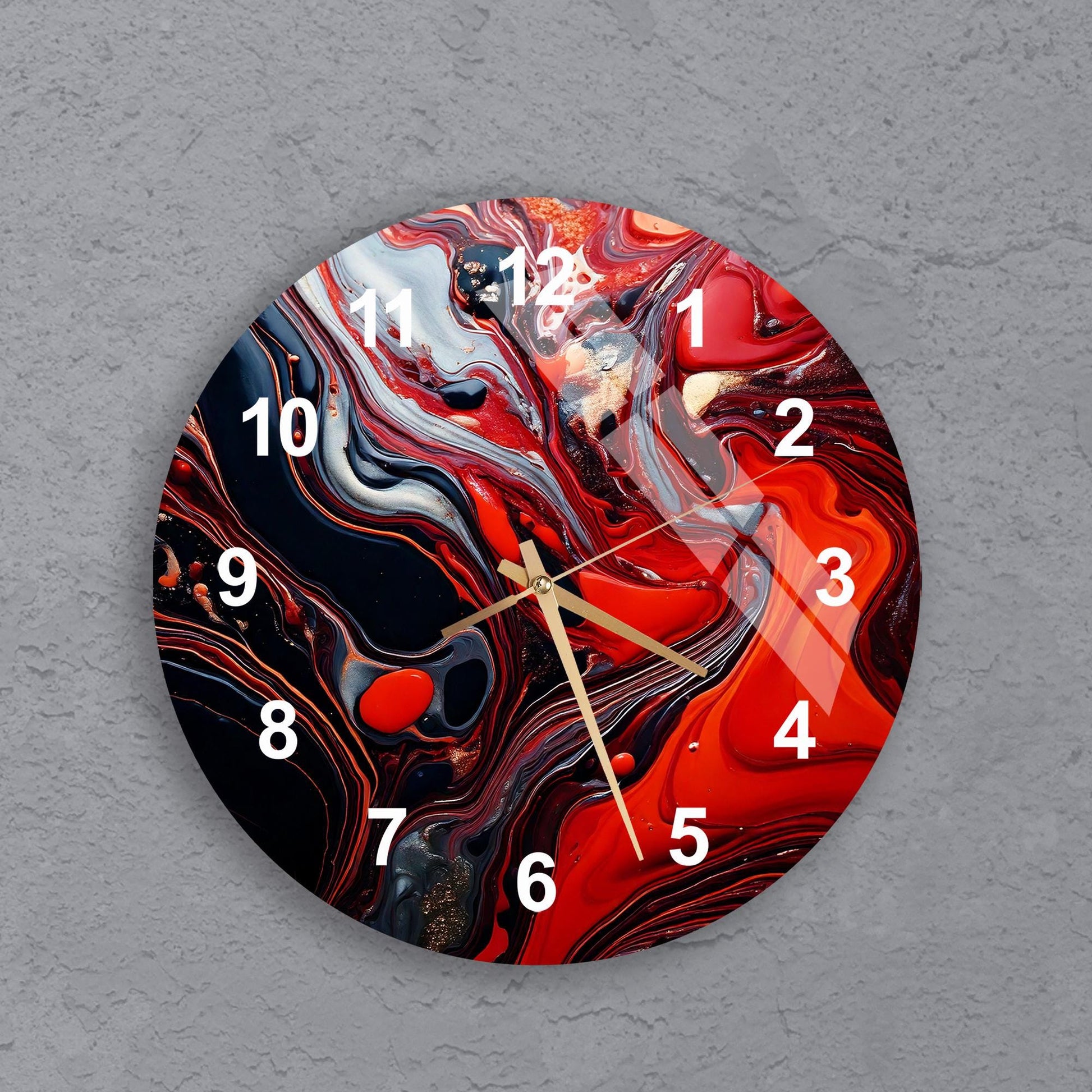 a clock with a red and black design on it