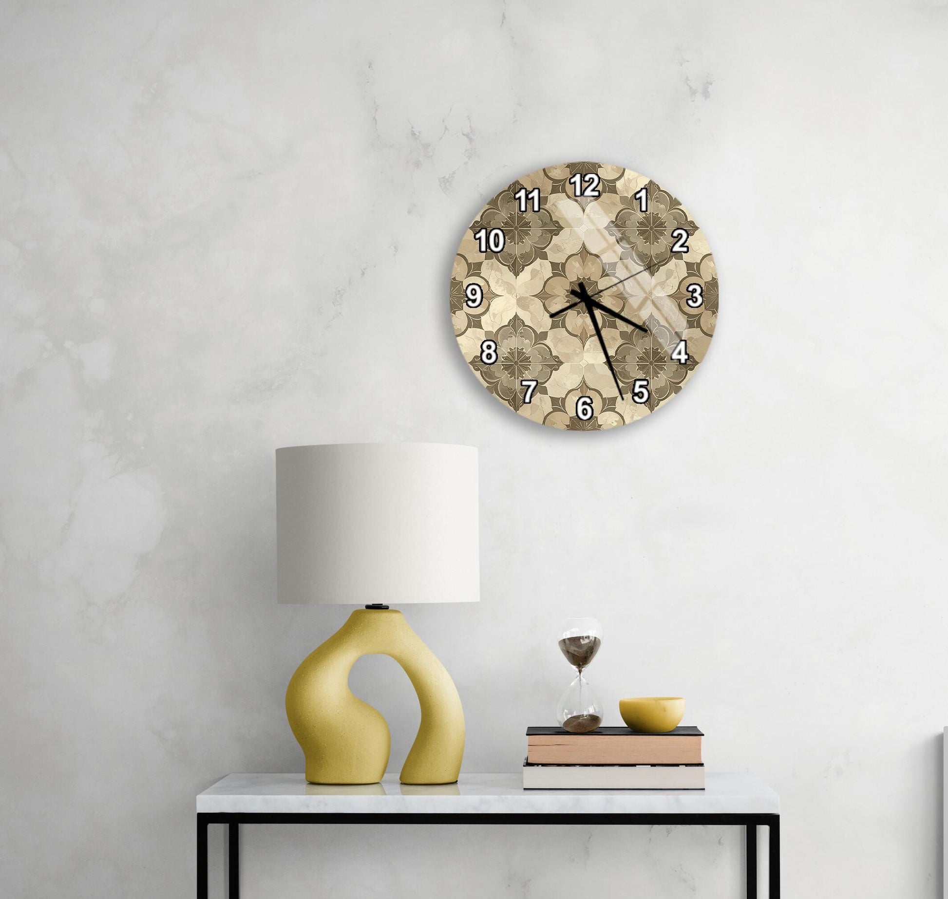 a modern living room with a round wall clock, a yellow lamp, a white table, and a stack of books.