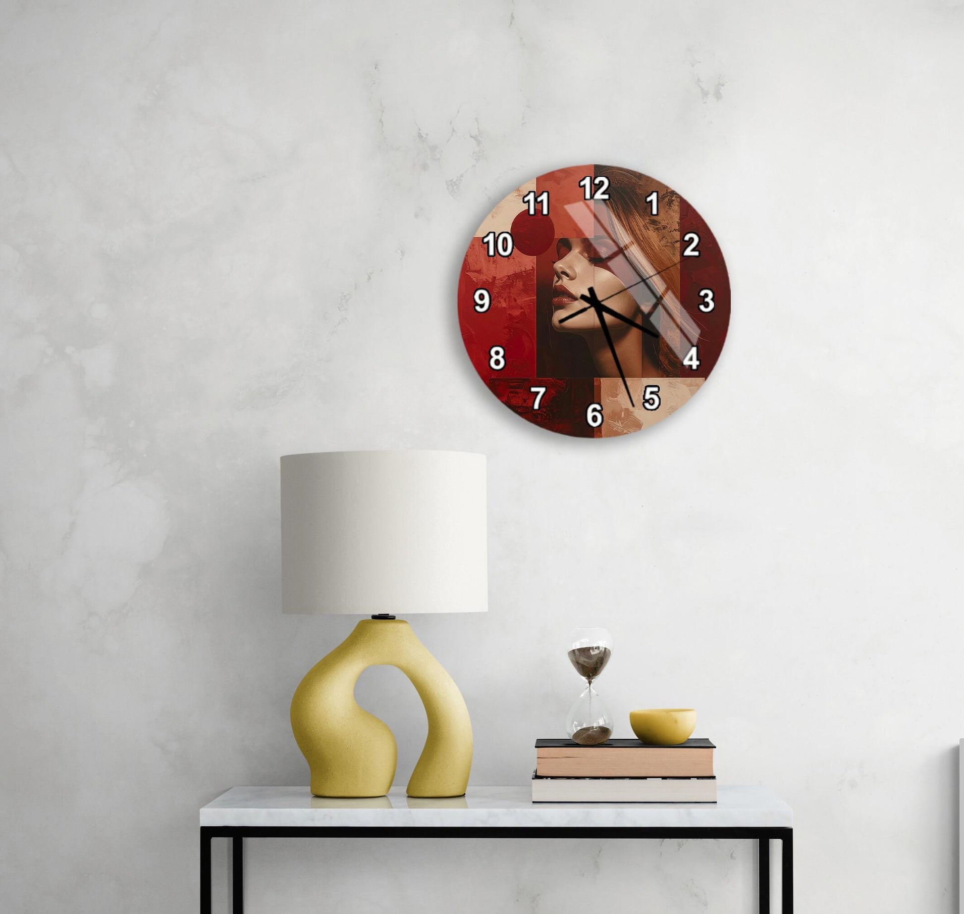 a modern interior design with a white wall, a round clock with a red face, a yellow lamp, a white table, and a stack of books.