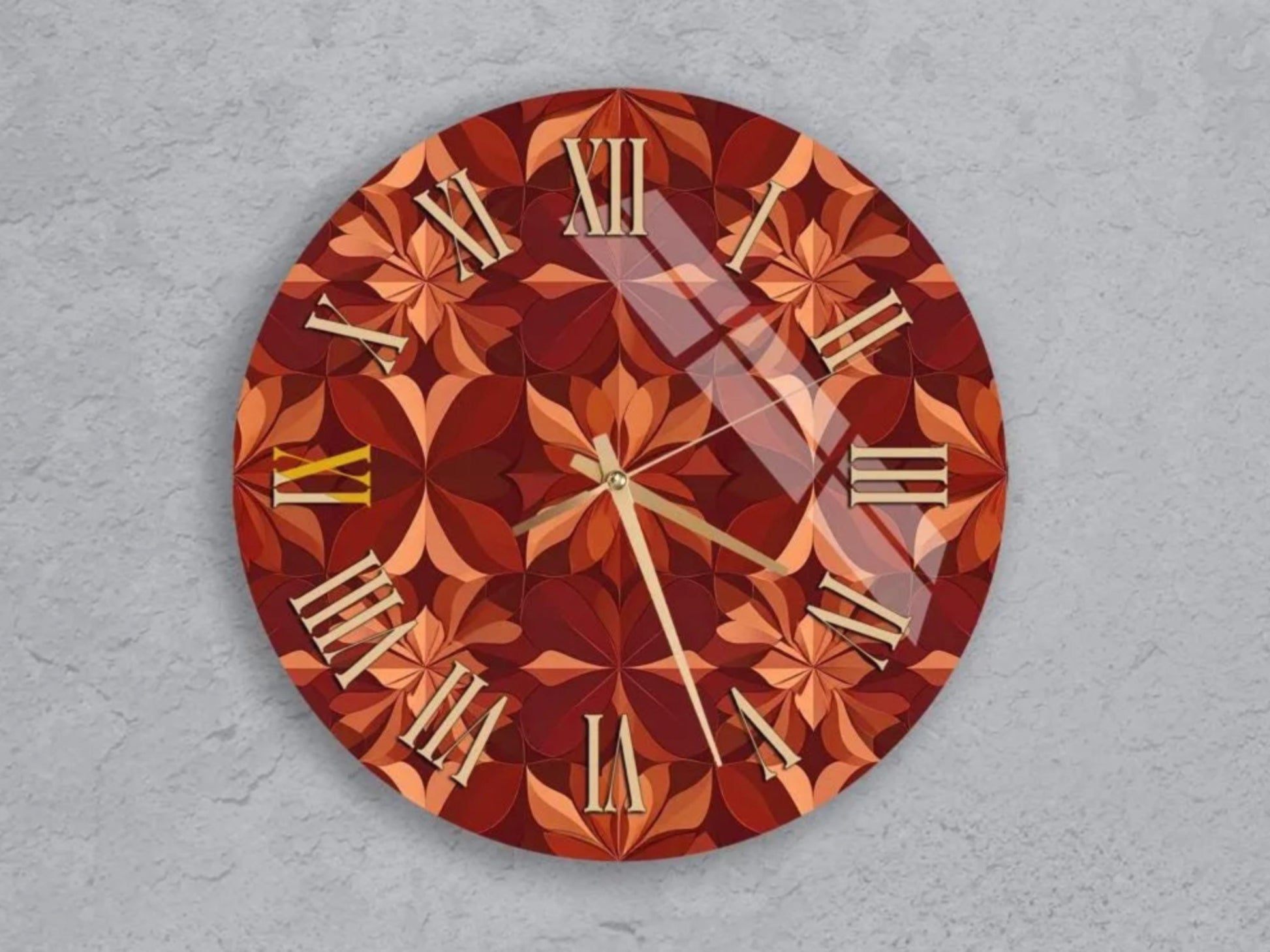 six round wall clocks with a red and orange geometric pattern, arranged in a grid on a gray background.