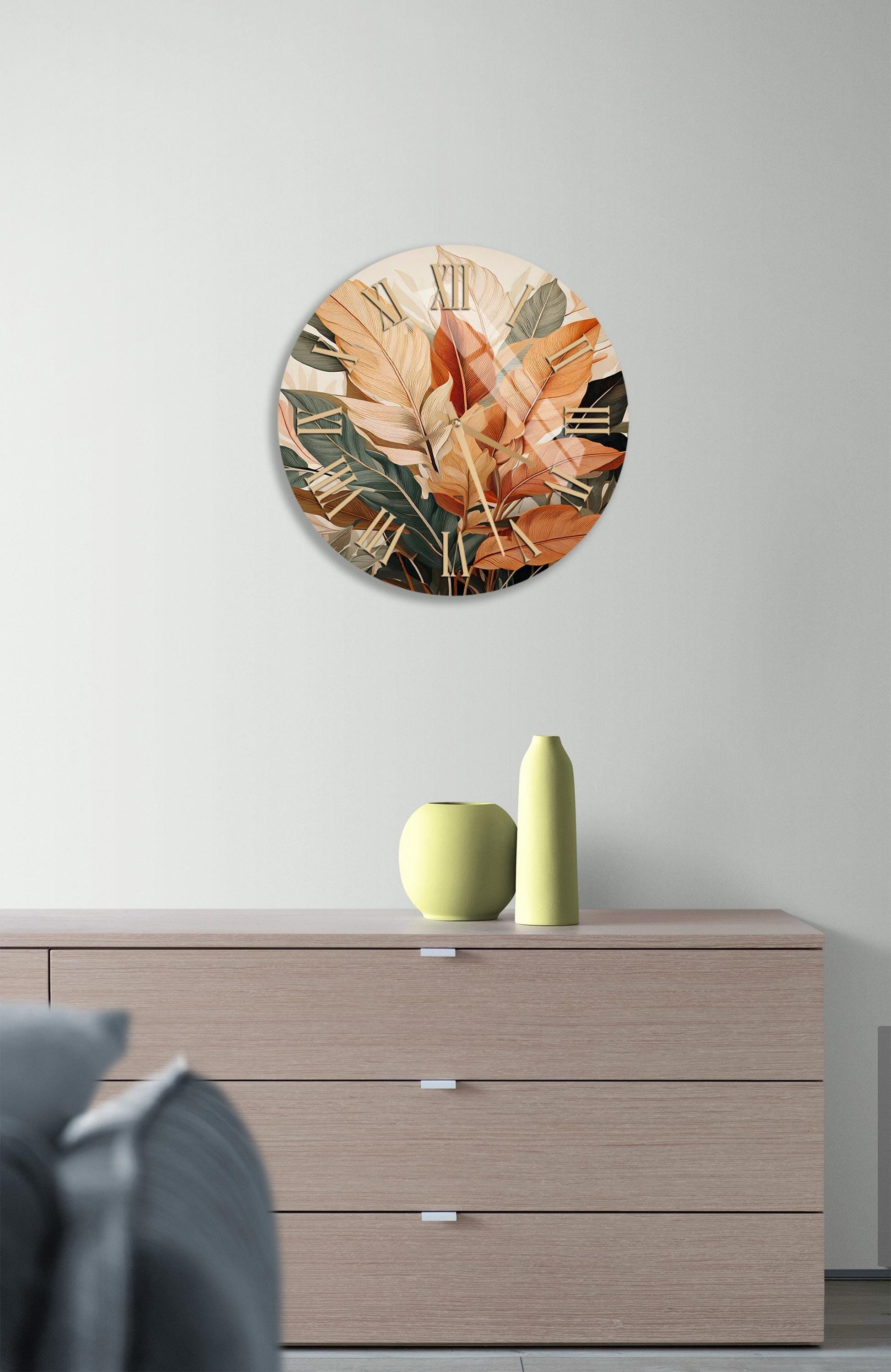 a clock on a wall above a dresser