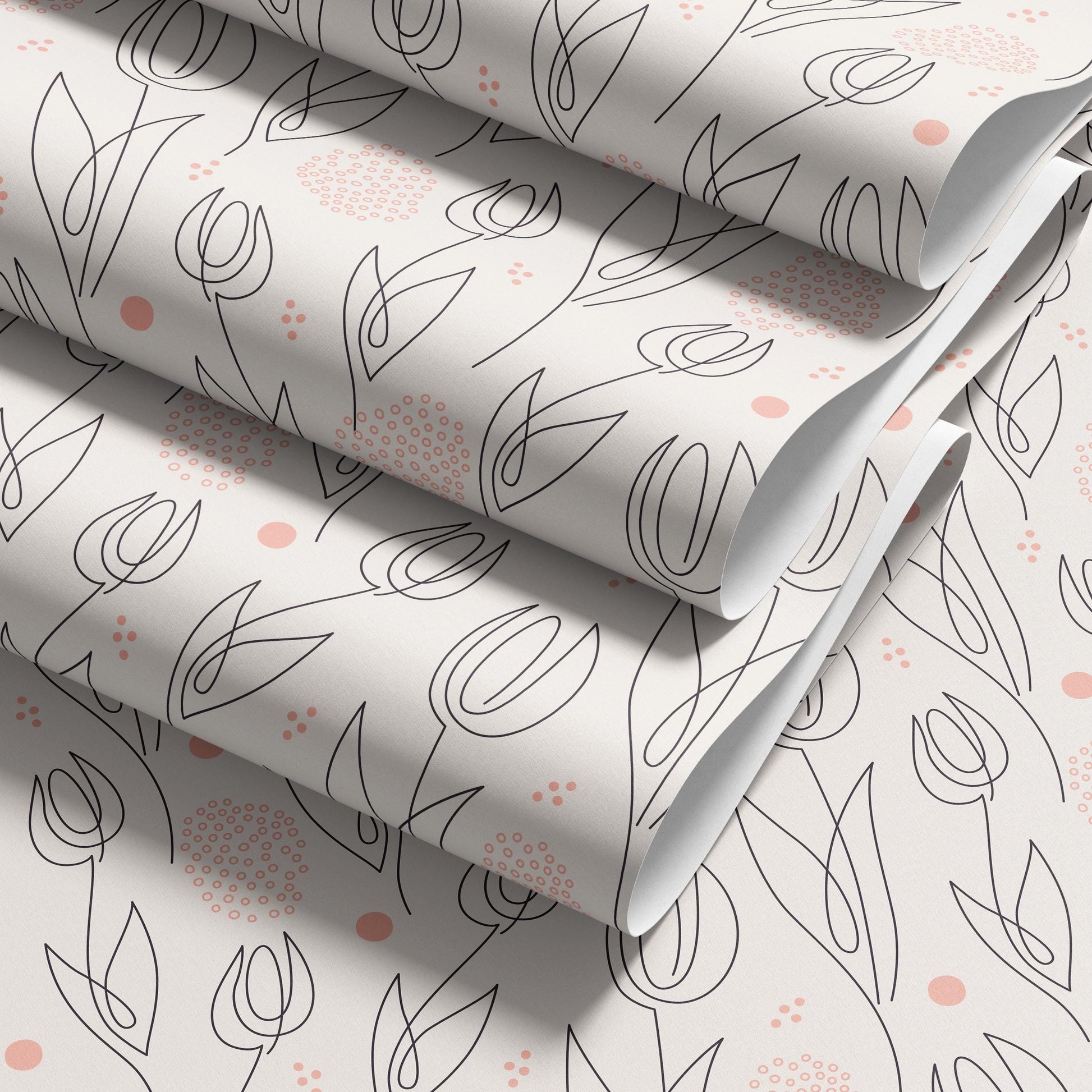 a repeating pattern of stylized tulips and leaves in black and white, with small pink dots scattered throughout the design.