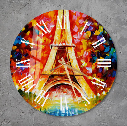 a clock with a painting of the eiffel tower