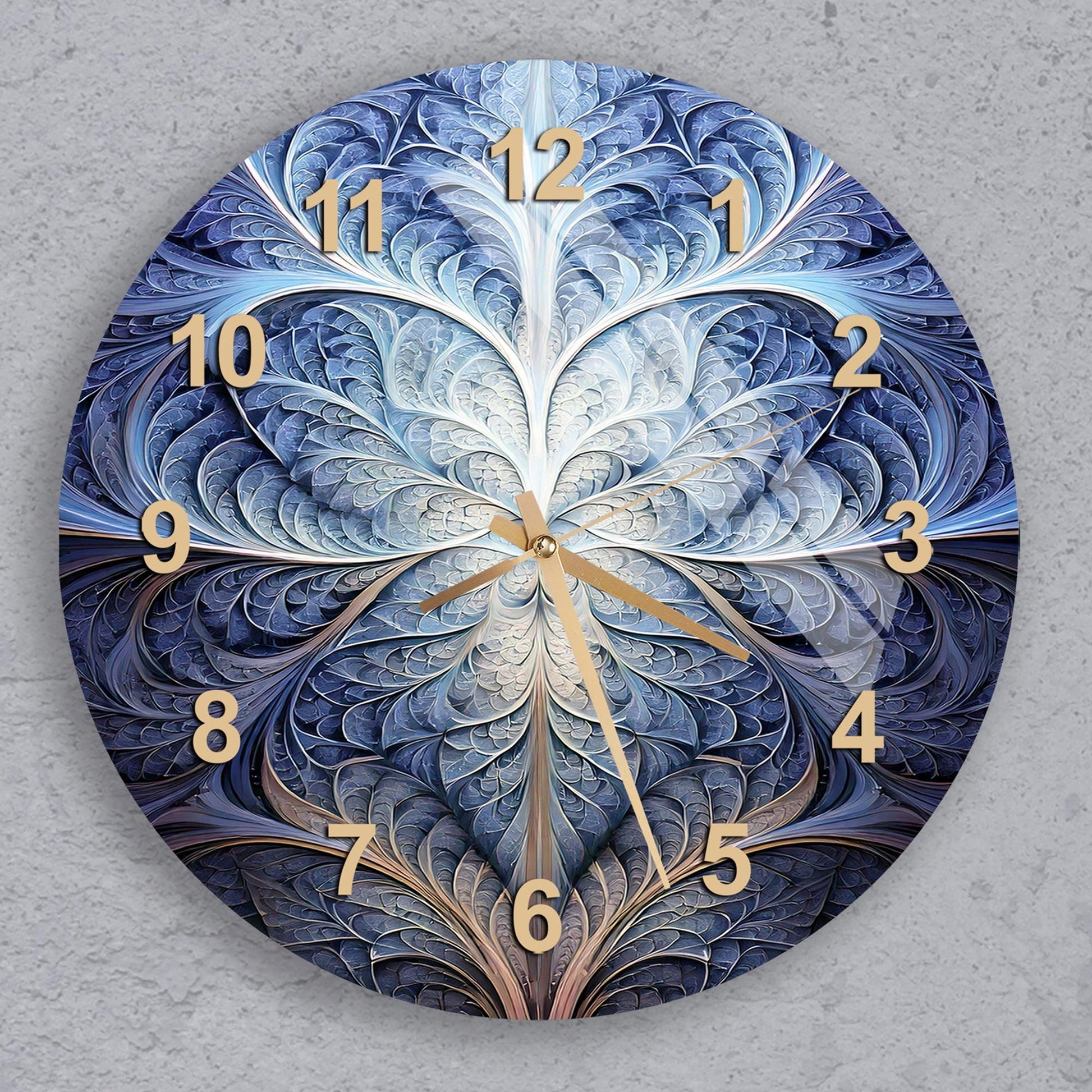 a clock with a blue and gold design on it