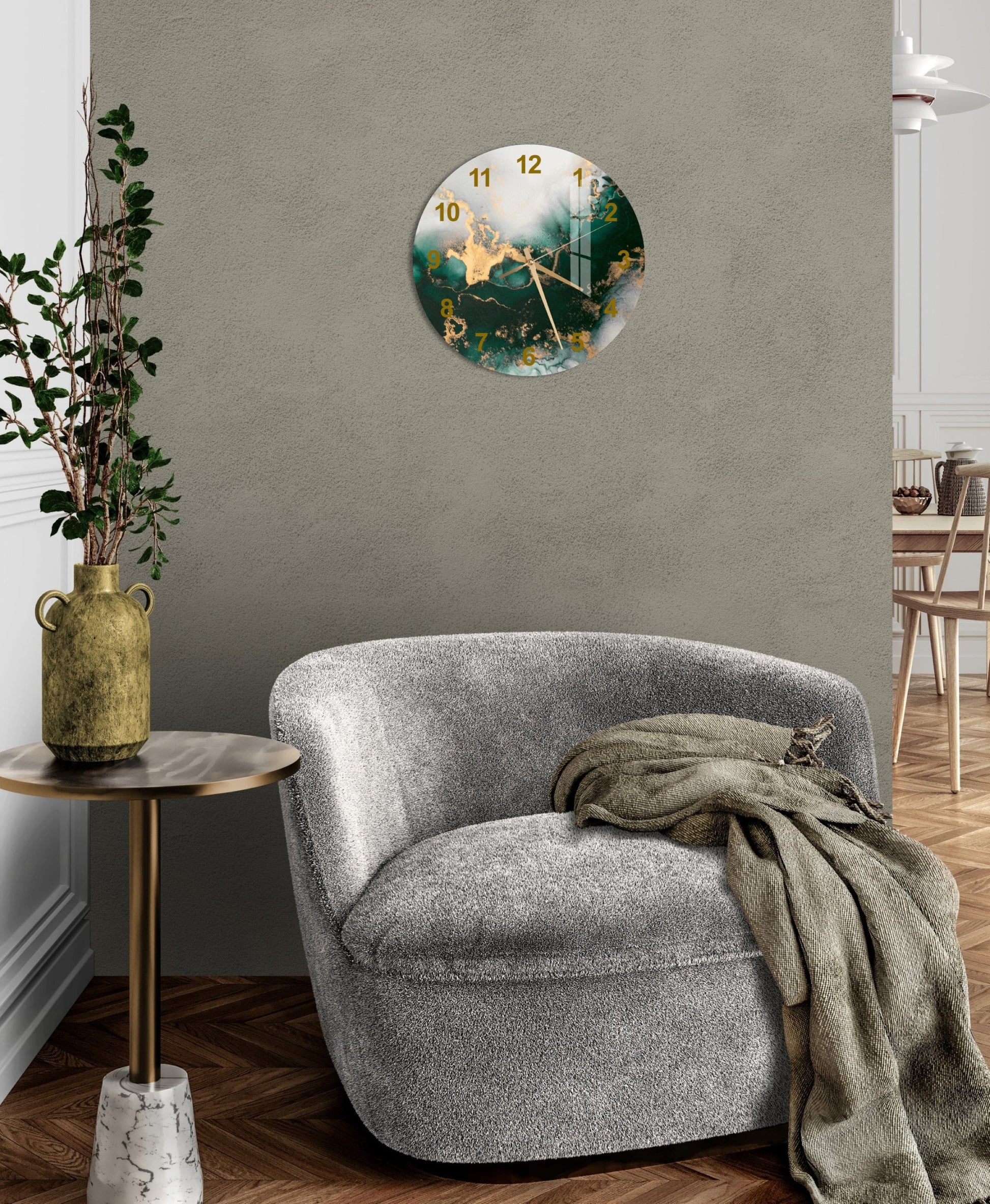 a living room with a chair and a clock on the wall