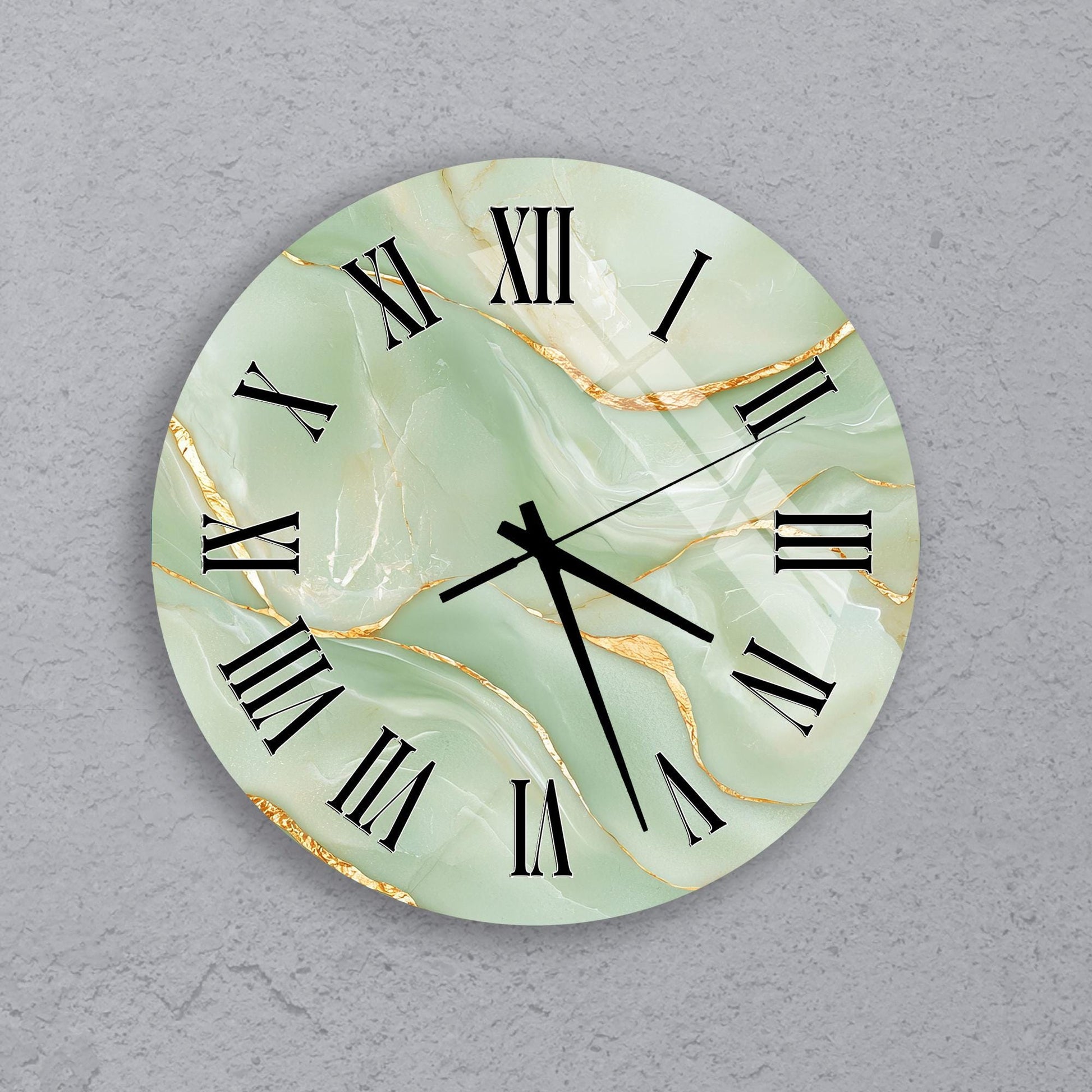 A round wall clock with a marble-like green and gold color scheme, featuring Roman numerals and hands.
