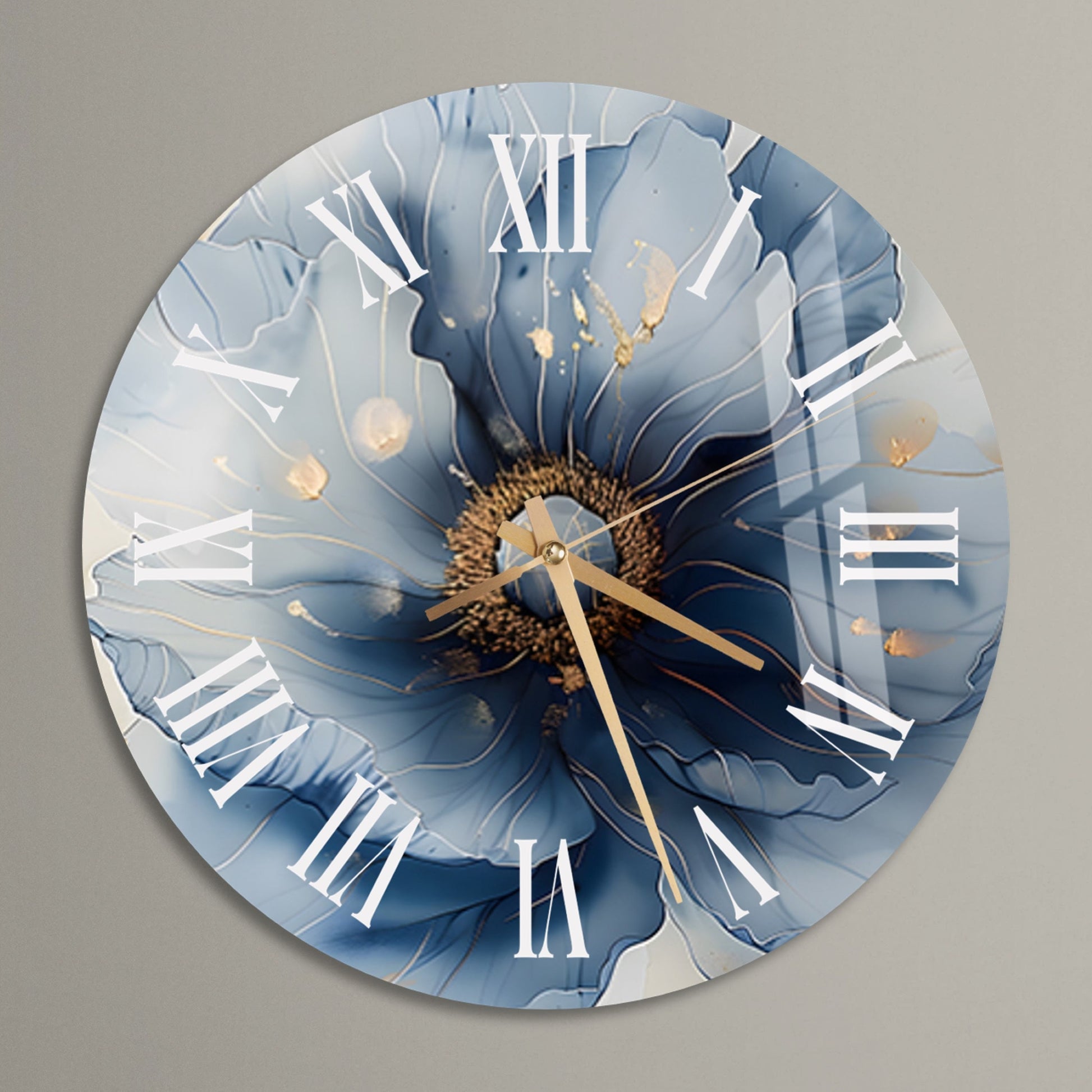 a clock with a blue flower painted on it