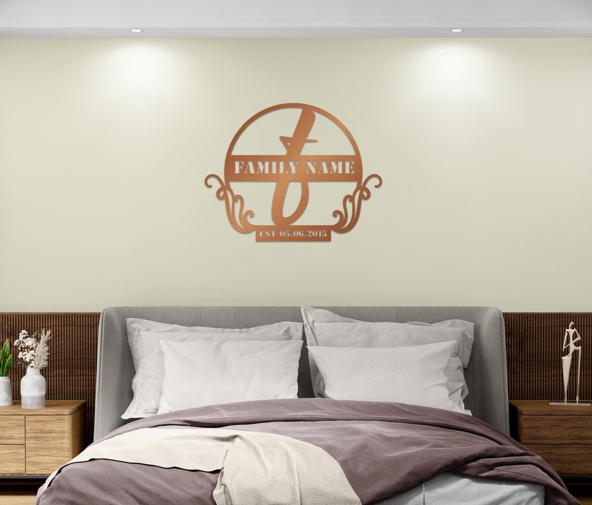 a bedroom with a large bed and a wall with a family name on it