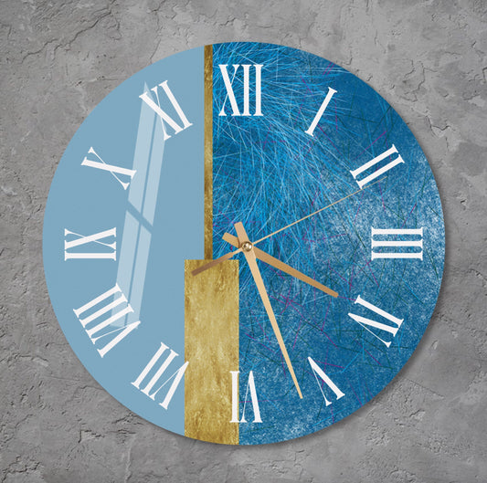 a blue and gold clock with roman numerals