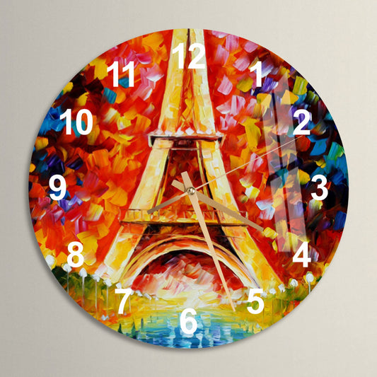 a clock with a painting of the eiffel tower
