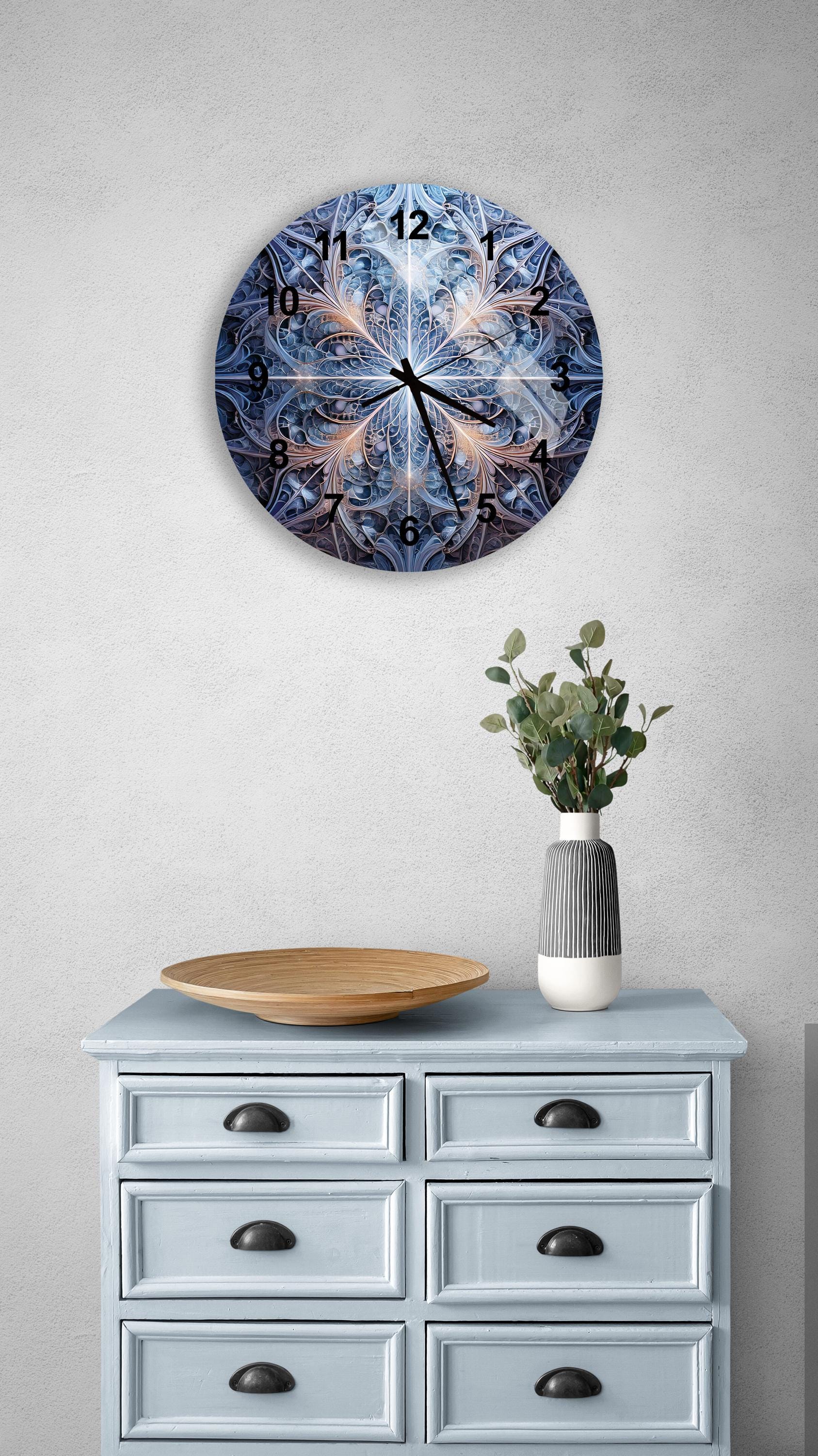 a clock on a wall above a dresser