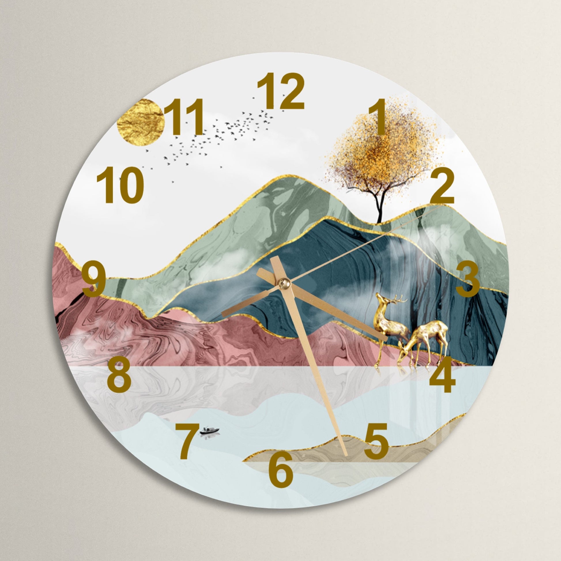 a clock with a painting of a mountain and a tree on it