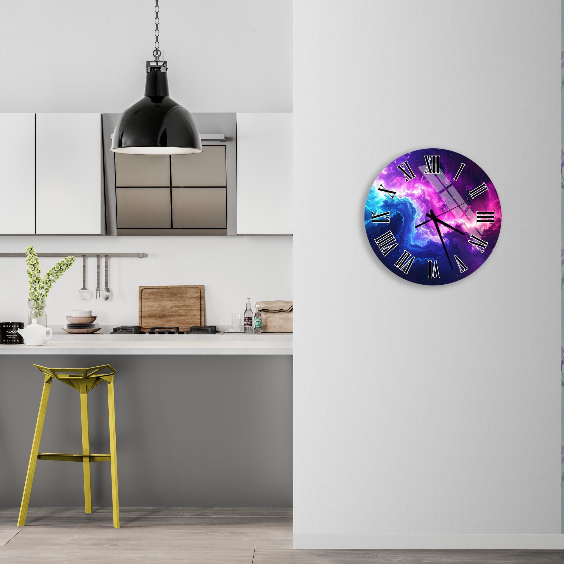 a kitchen with a colorful clock on the wall, a yellow stool, and a hanging light fixture.
