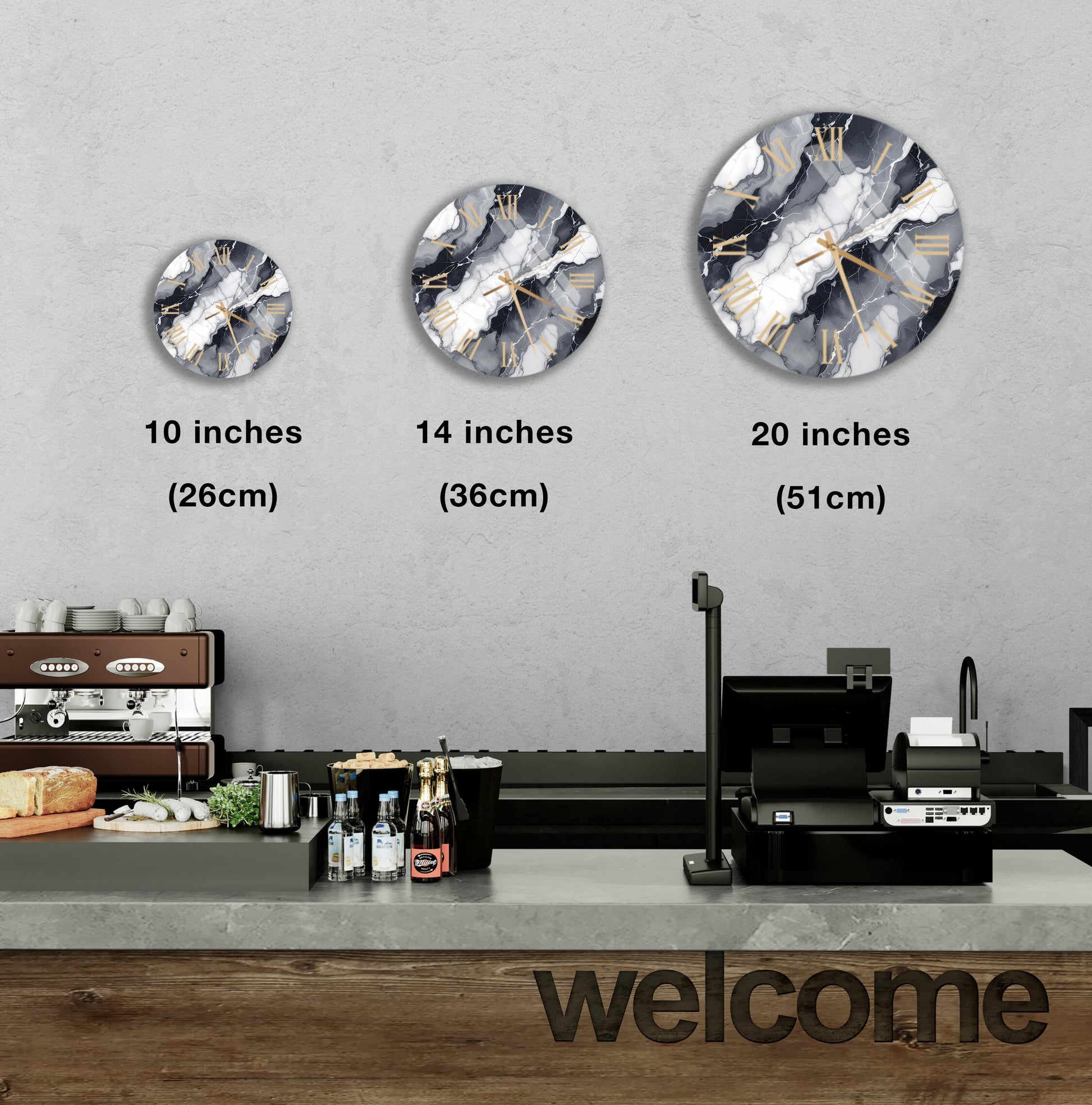 a counter with a cash register, a coffee machine, and a display of various items such as bottles and bread. Above the counter, there are three clock designs, each representing a different size: 10 inches, 14 inches, and 20 inches. The image also includes text indicating the sizes of the clocks, with the words "10 inches (26cm)", "14 inches (36cm)", and "20 inches (51cm)" placed above each clock.