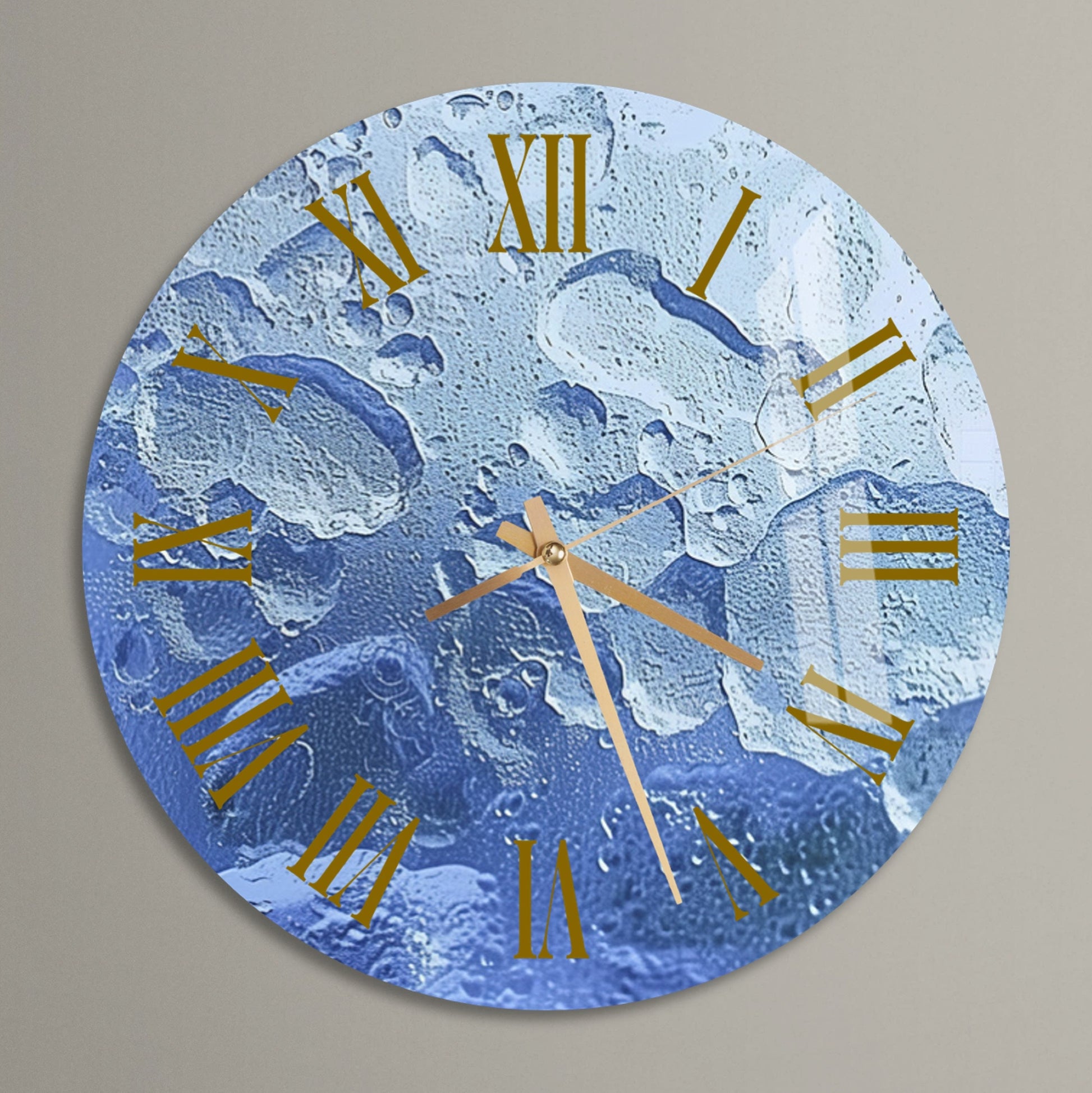 a blue clock with gold hands on a gray wall