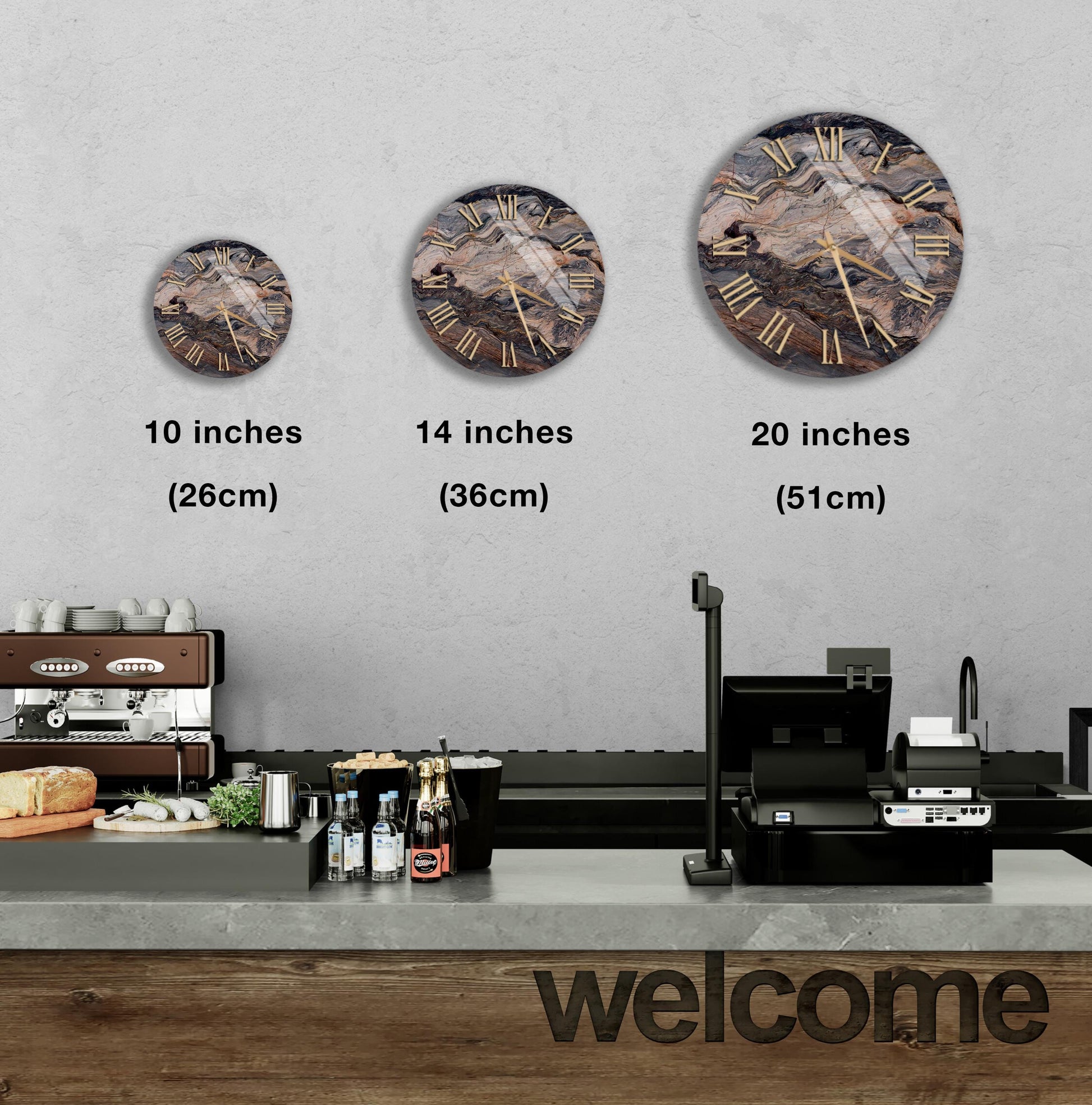 a counter with a cash register, a coffee machine, and various food items such as bottles and bread. Above the counter, there are three clock faces of different sizes, each displaying a different time. The image also includes text indicating the sizes of the clock faces in inches.