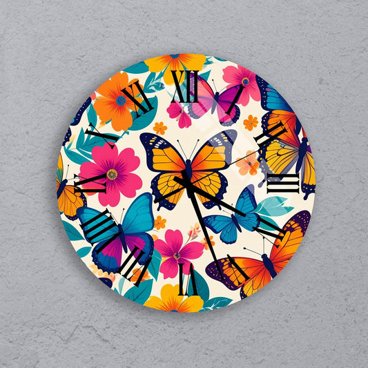 A round clock with a floral design featuring colorful butterflies and flowers.