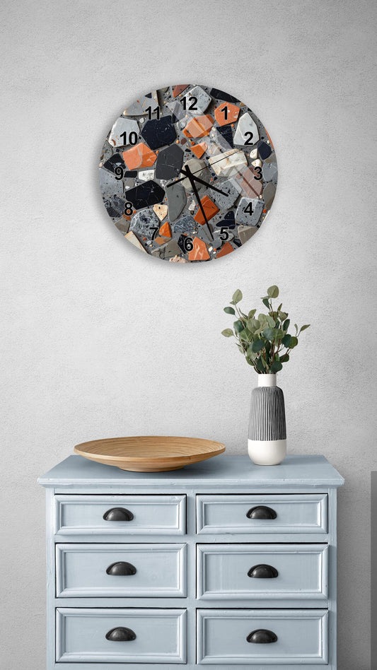 a wall clock with a mosaic design, a wooden tray, a vase with greenery, and a light blue dresser with six drawers.