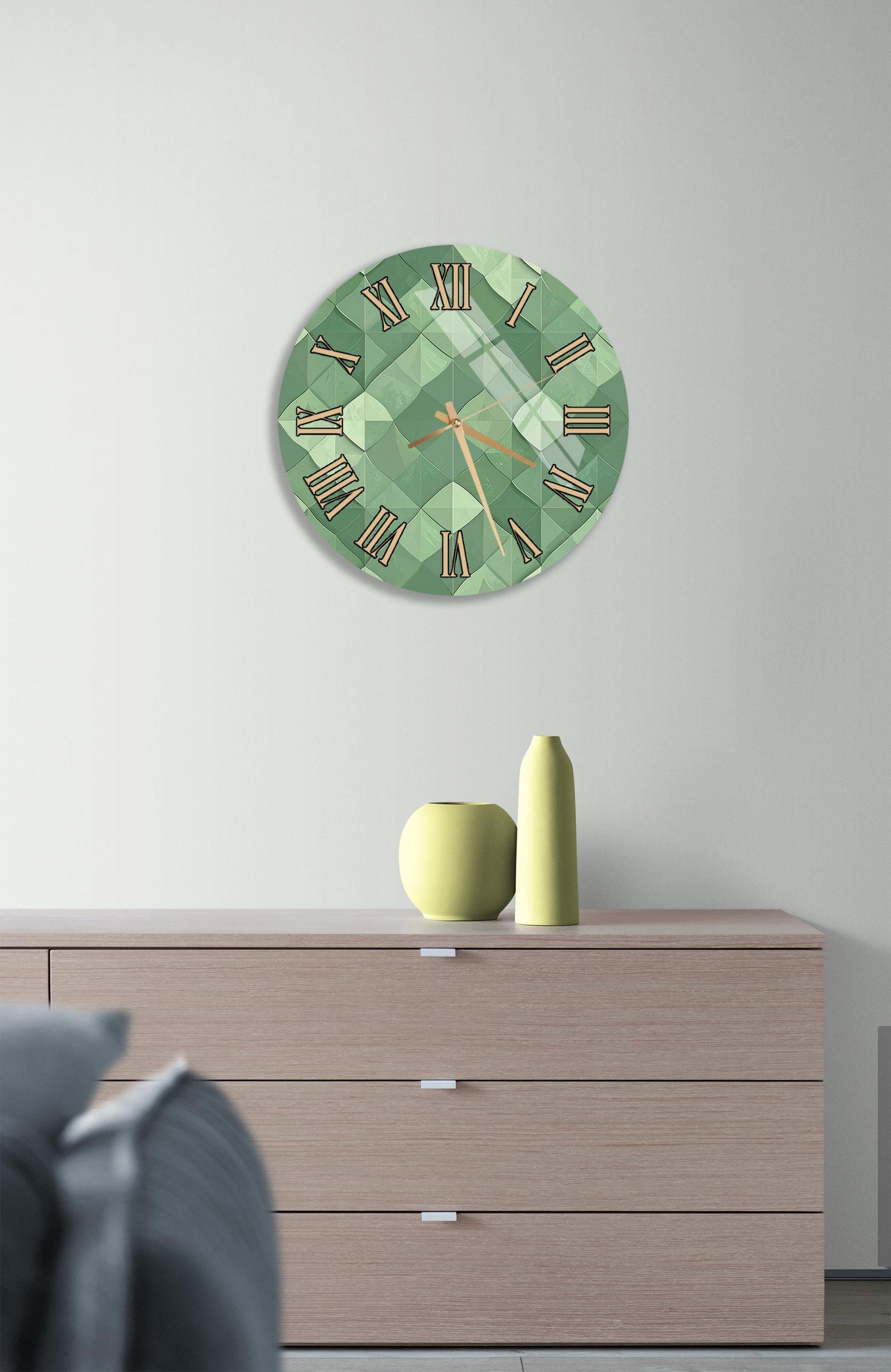 a modern living room with a green clock on the wall above a wooden dresser. The dresser has three drawers and a vase on top.