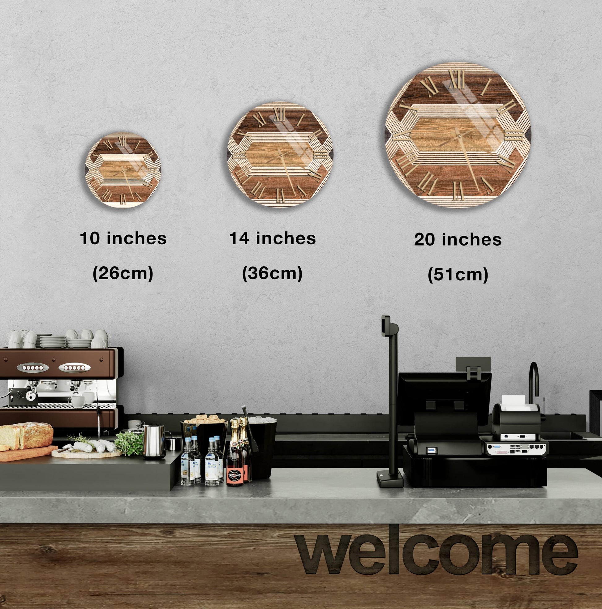 a counter with a cash register, a coffee machine, and various food items such as bottles and bread. Above the counter, there are three clock faces of different sizes, indicating the time in inches. The counter also has a "welcome" sign, suggesting a welcoming atmosphere in the space.