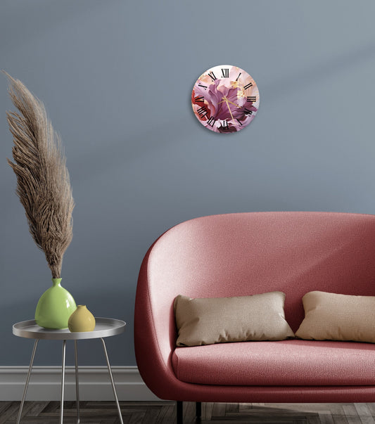 a living room with a couch and a clock on the wall