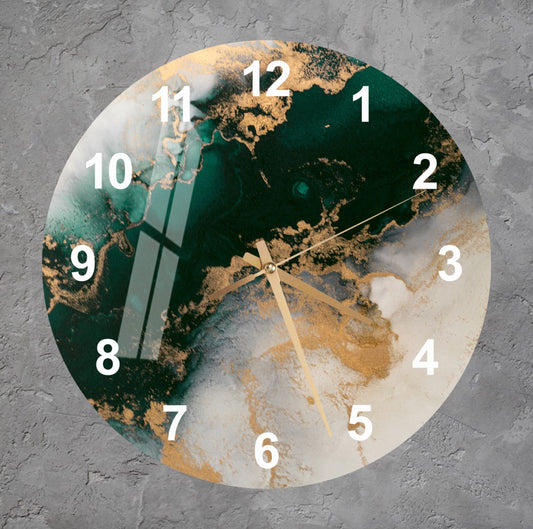 a clock with a green and gold design on it