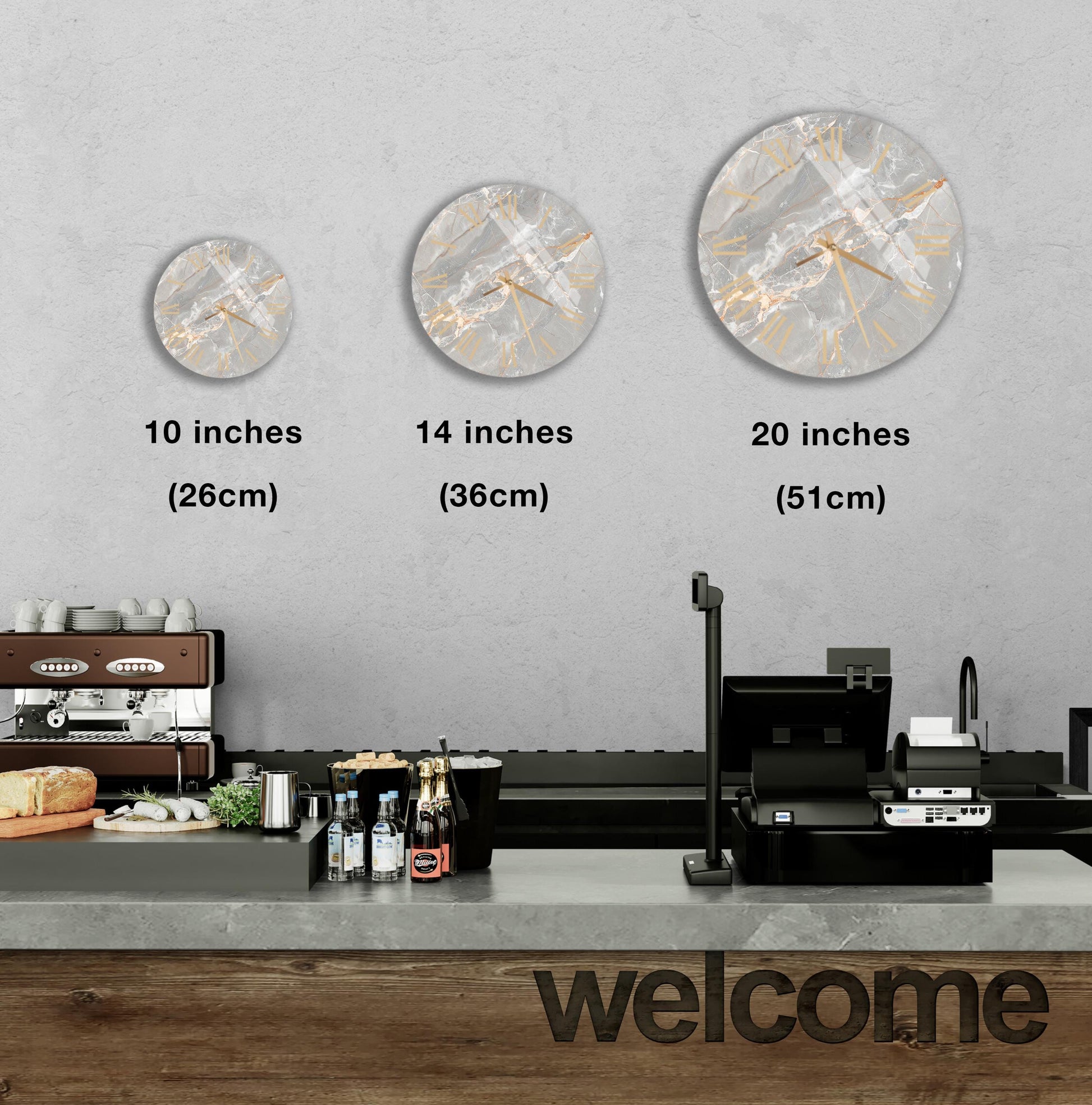 a counter with a cash register, a coffee machine, and various food items such as bottles and bread. Above the counter, there are three clock faces of different sizes, indicating the time in inches. The counter also has a "welcome" sign, suggesting a welcoming atmosphere in the space.