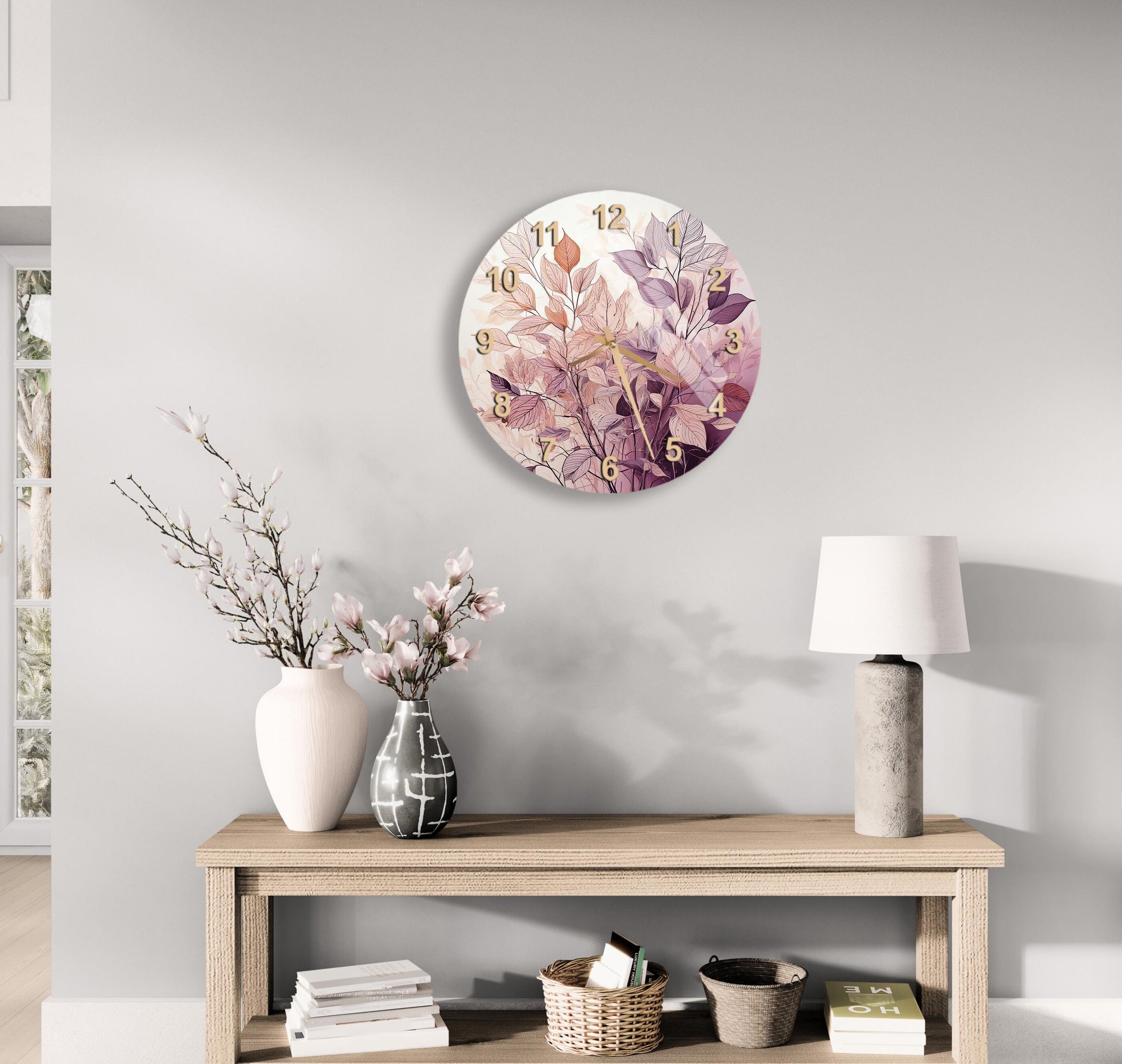 a table with a vase of flowers and a clock on the wall
