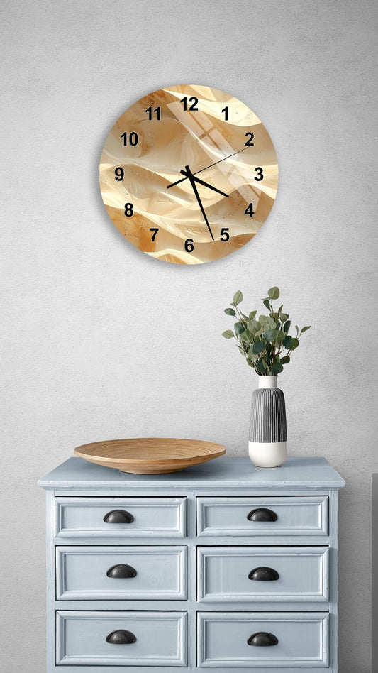 a wall clock with a unique, textured design, mounted on a wall above a light blue dresser with six drawers. The dresser also has a vase with greenery on it, and there is a wooden plate on the dresser.