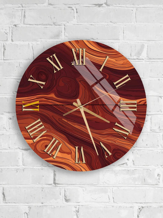 A round wall clock with a marbled design and gold Roman numerals is mounted on a white brick wall.