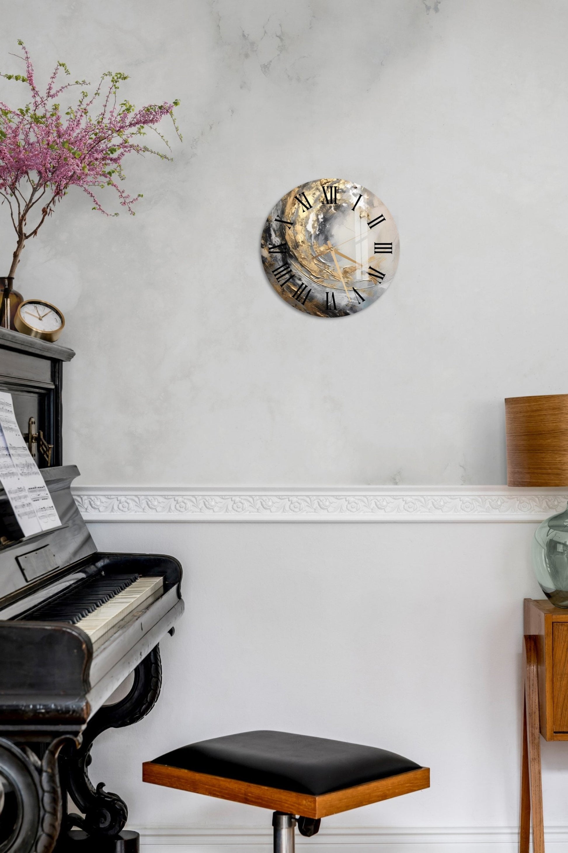 a room with a piano and a clock on the wall