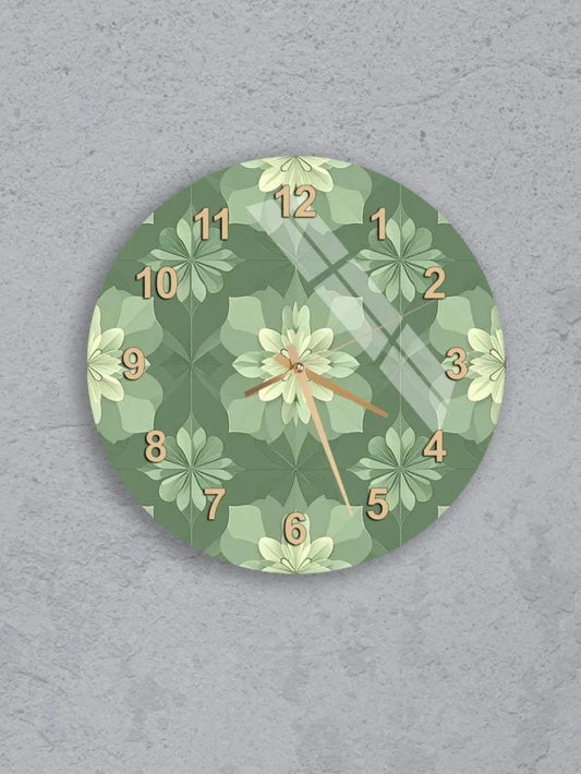 six round wall clocks with green floral designs on their faces, arranged in a grid pattern on a gray background.