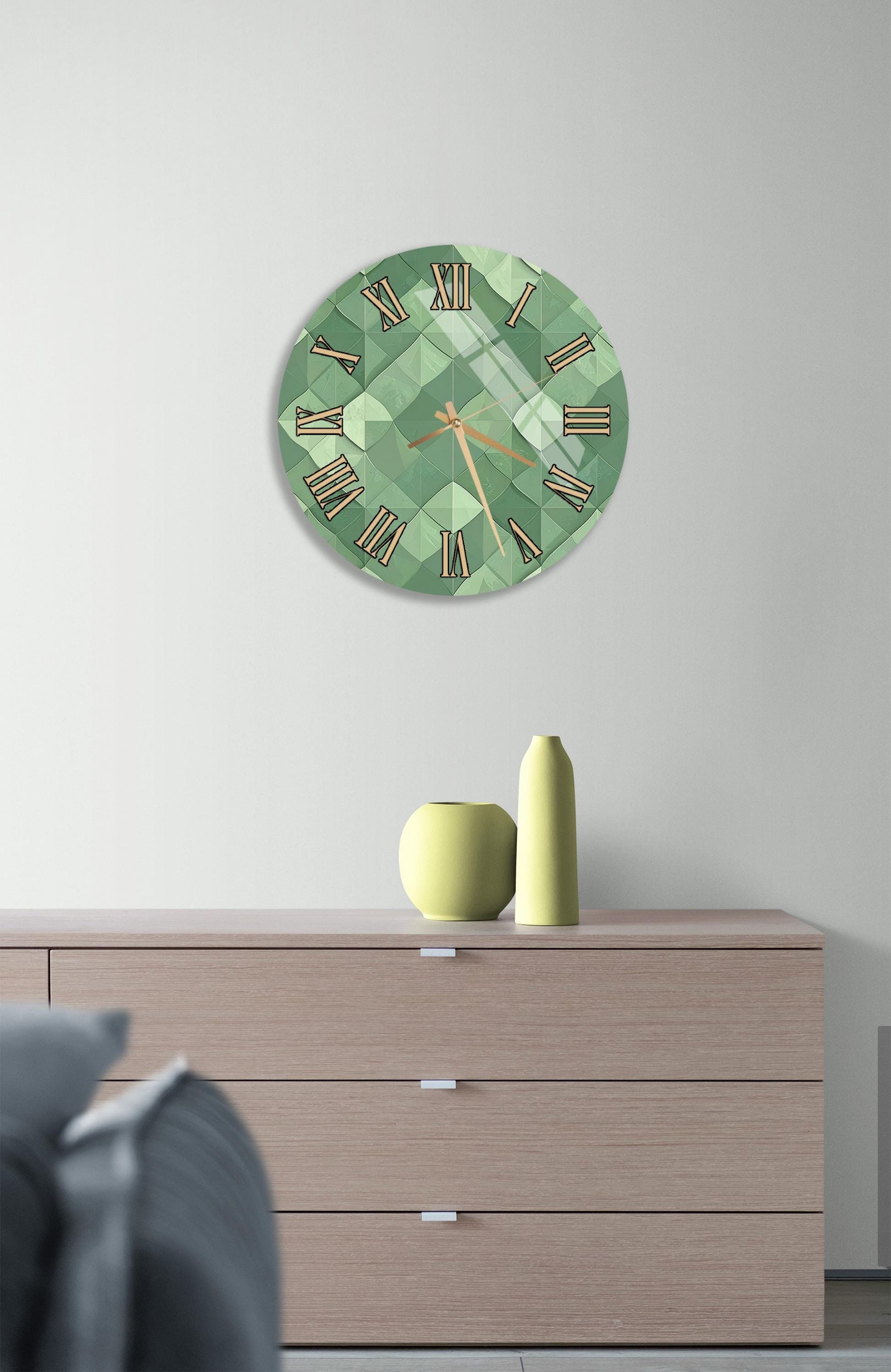 a modern living room with a green clock on the wall above a wooden dresser. The dresser has three drawers and a vase on top.