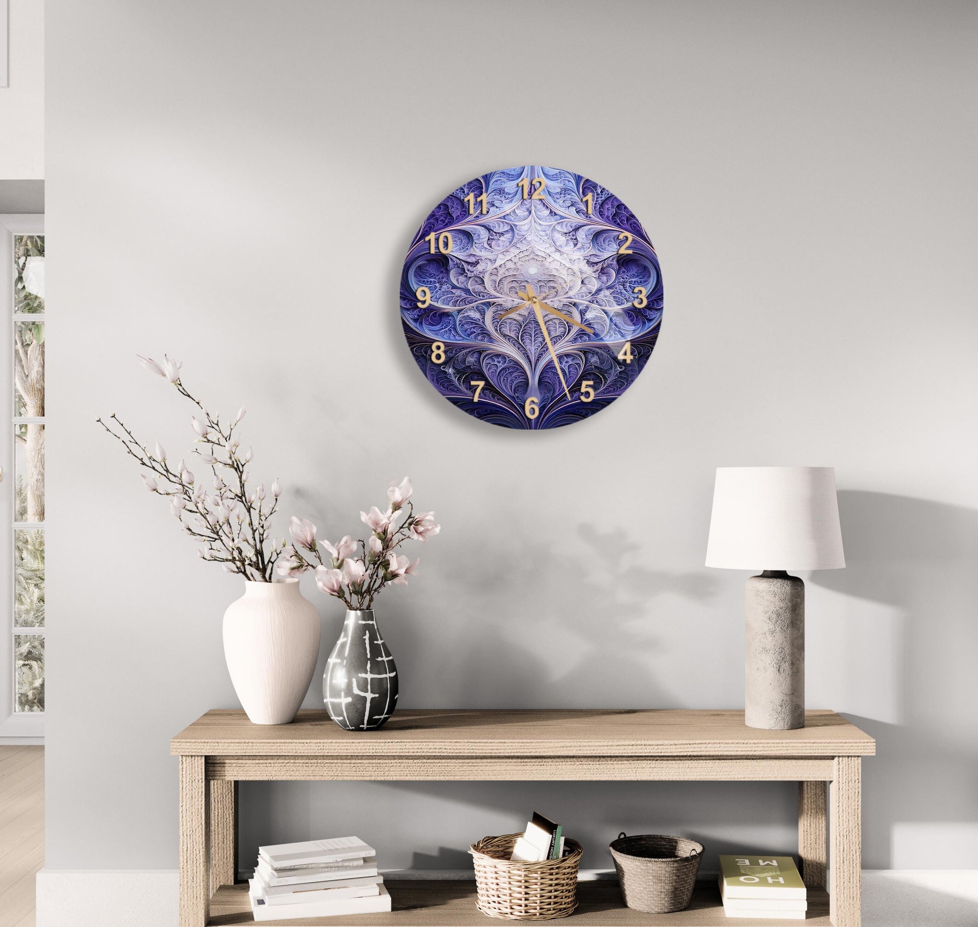 a clock on a wall above a table with a vase of flowers