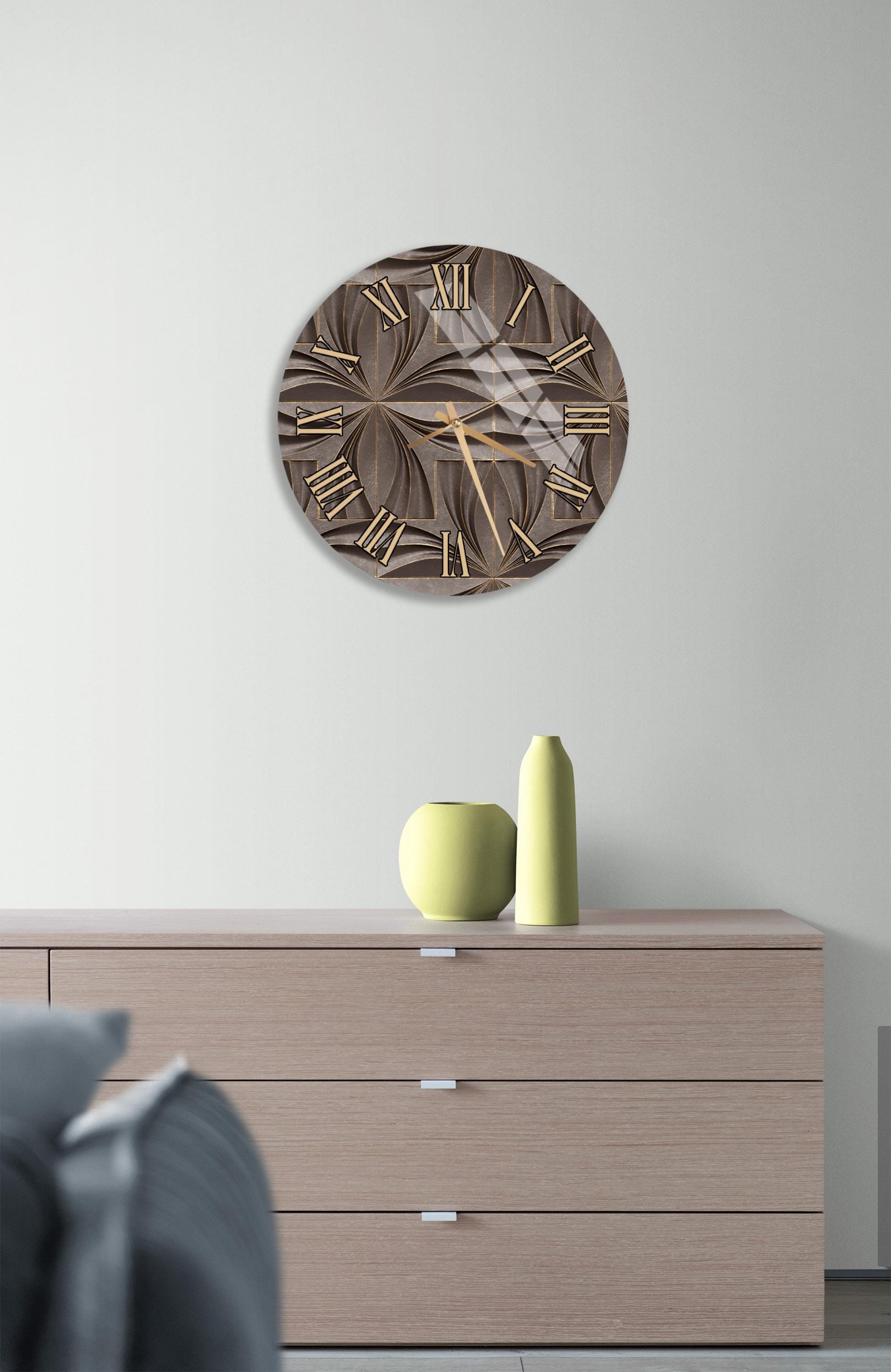 a modern living room with a large wall clock, a wooden dresser, and a green vase on top of the dresser.