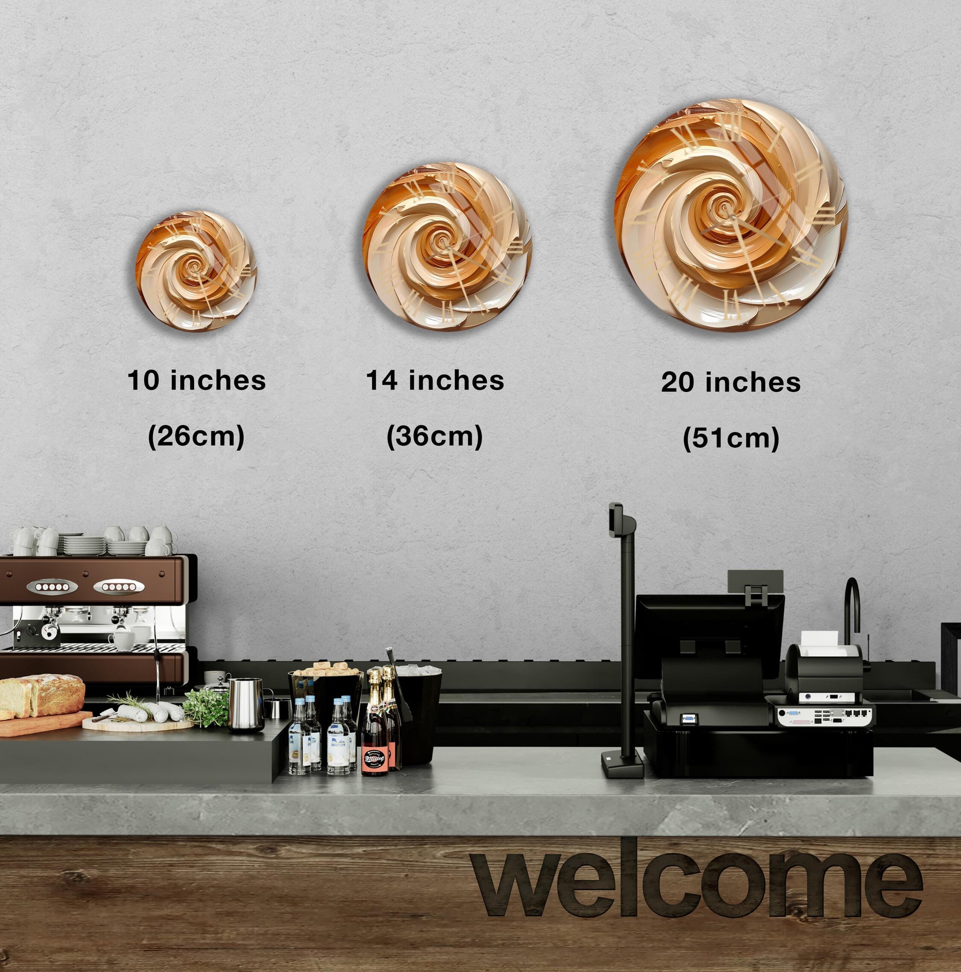a counter in a restaurant with three different sizes of spiral designs on the wall above it, and a welcome sign below the counter.